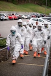 Members of the West Virginia National Guard’s Task Force Chemical, Biological, Radiological and Nuclear (CBRN) Response Enterprise (CRE) (TF-CRE) assist staff, medical personnel, and first responders of an Eastbrook Center nursing home with COVID-19 testing April 6, 2020, in Charleston, West Virginia, after a resident tested positive for the pandemic virus. Members donned proper personal protective equipment (PPE) to complete testing on more than 120 residents and 25 staff as part of ongoing operations across West Virginia in support of a whole of government response effort. (U.S. Army National Guard photo by Edwin L. Wriston)