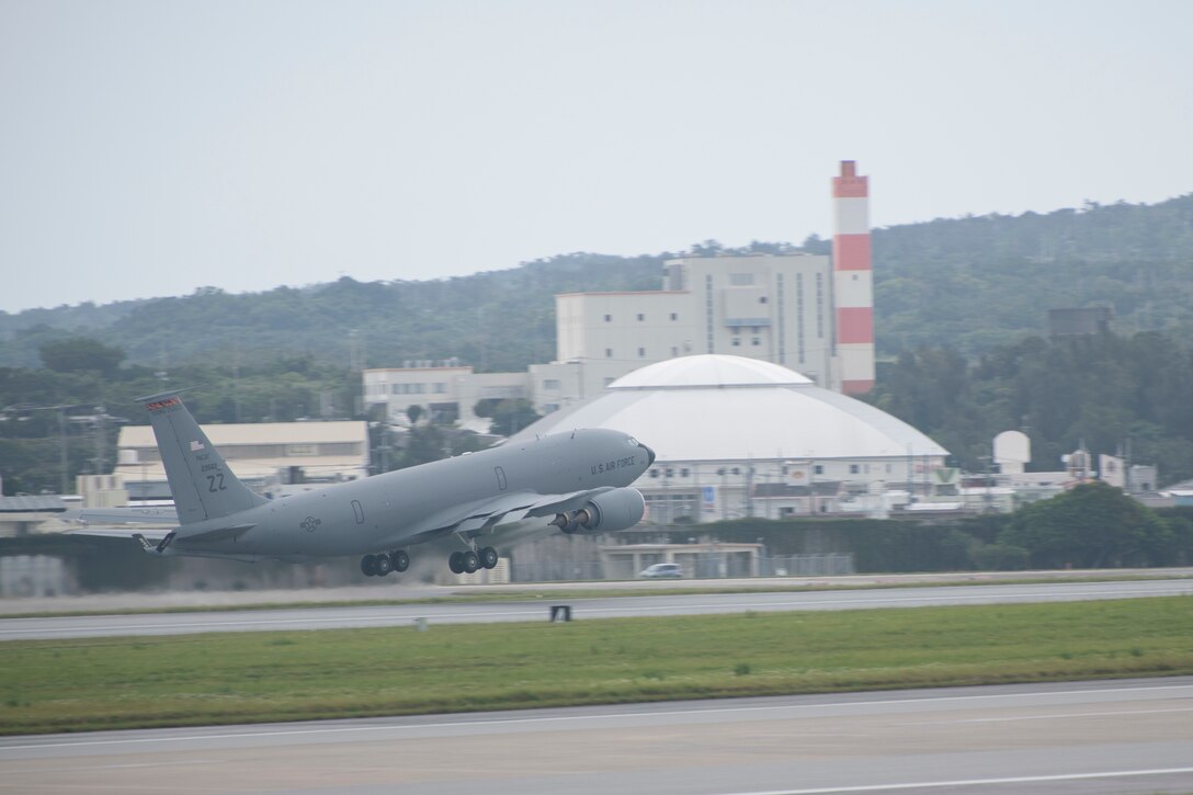 A U.S. Air Force KC-135 Stratotanker, assigned to the 909th Air Refueling Squadron, takes off April 6, 2020, at Kadena Air Base, Japan. Team Kadena is postured to protect its forces against COVID-19 while also maintaining mission readiness in support of the U.S.-Japan Alliance. The 909 ARS conducts aerial refueling missions throughout the region ensuring a free and open Indo-Pacific.  (U.S. Air Force photo by Senior Airman Rhett Isbell)