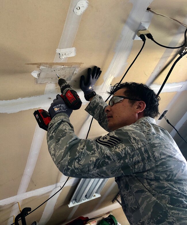 A photo of U.S. Air Force Tech. Sgt. Victor Reinares, a 624th Civil Engineer Squadron structural craftsman, conducting hands-on preplanned component of his training from home in Hawaii as part of the 624th Regional Support Group virtual unit training assembly April 4, 2020. Air Force Reserve Airmen in Hawaii and Guam continued mission readiness training during the first-ever 624th RSG virtual UTA, which was implemented to help keep Airmen safe during COVID-19 pandemic. (Courtesy Photo)