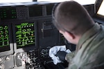 U.S. Air Force Senior Airman Kyle Hodge, 86th Aircraft Maintenance Squadron flying crew chief, wipes down hydraulic switches with a disinfectant solution on a C-130J Super Hercules aircraft, Ramstein Air Base, Germany, April 1, 2020.