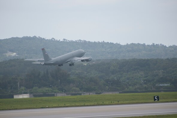 A U.S. Air Force KC-135 Stratotanker, assigned to the 909th Air Refueling Squadron, takes off April 6, 2020, at Kadena Air Base, Japan. Team Kadena is postured to protect its forces against COVID-19 while also maintaining mission readiness in support of the U.S.-Japan Alliance. The 909 ARS conducts aerial refueling missions throughout the region ensuring a free and open Indo-Pacific.  (U.S. Air Force photo by Senior Airman Rhett Isbell)