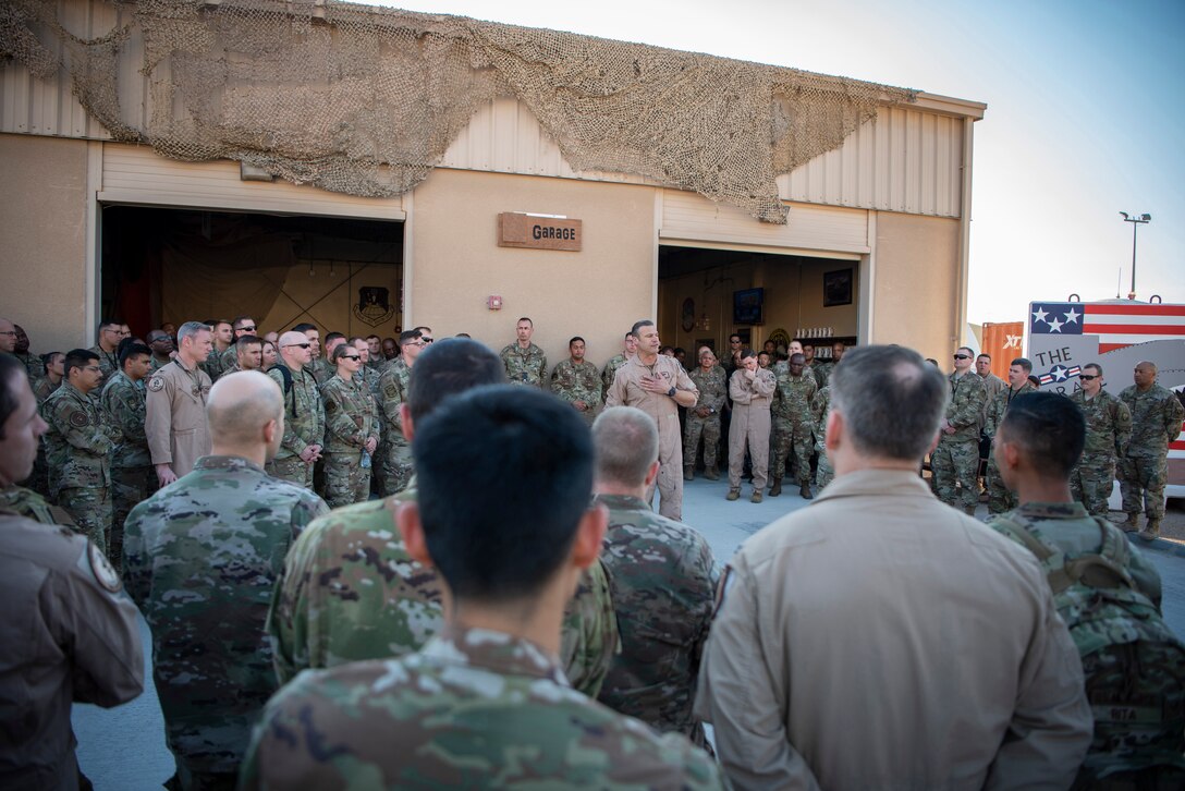U.S. Air Force Lt. Gen. Joseph Guastella, U.S. Air Forces Central Command Commander, speaks with AFCENT Airmen outside of the combined air operations center at Al Udeid Air Base, Qatar, March 6, 2020.