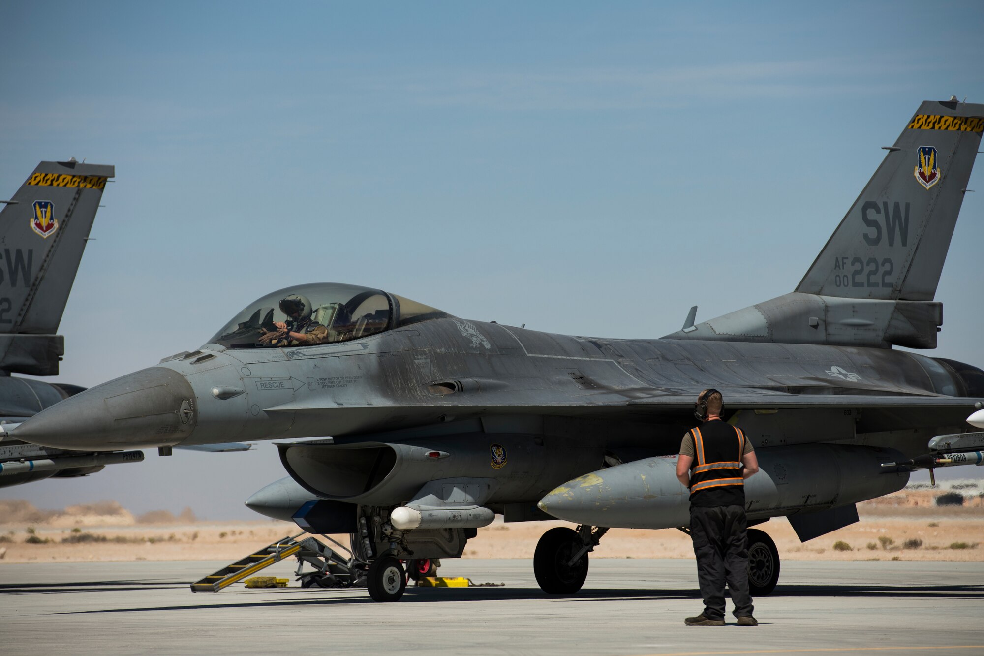 A U.S. Air Force F-16 “Viper” Fighting Falcon pilot assigned to the 79th Expeditionary Fighter Squadron waits to takeoff at an undisclosed location in the U.S. Central Command area of responsibility, Feb. 24, 2020.