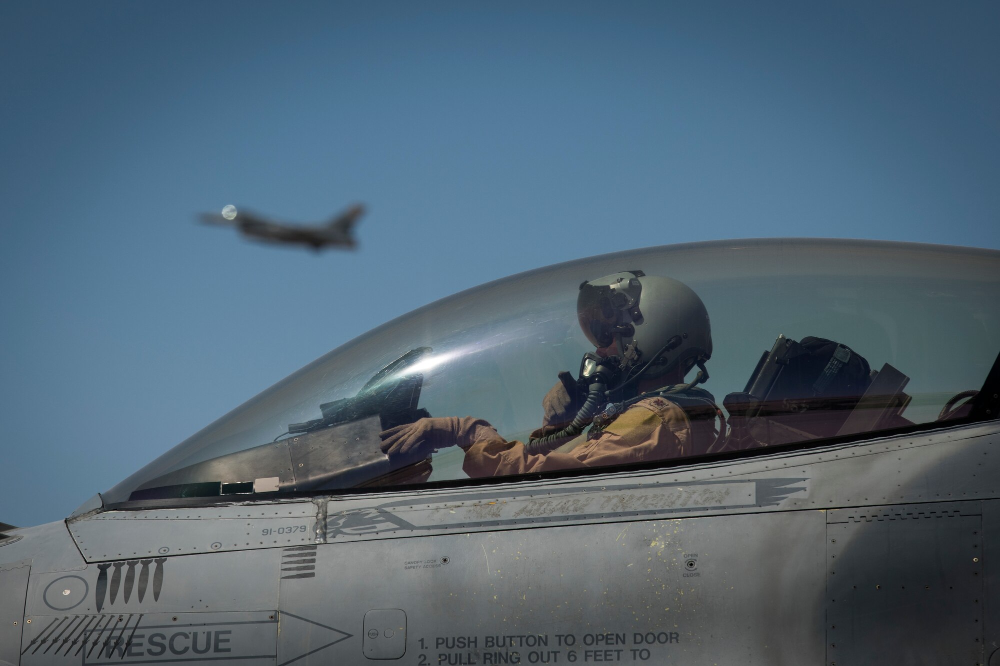 A U.S. Air Force F-16 “Viper” Fighting Falcon pilot assigned to the 79th Expeditionary Fighter Squadron waits to takeoff at an undisclosed location in the U.S. Central Command area of responsibility, Feb. 24, 2020.