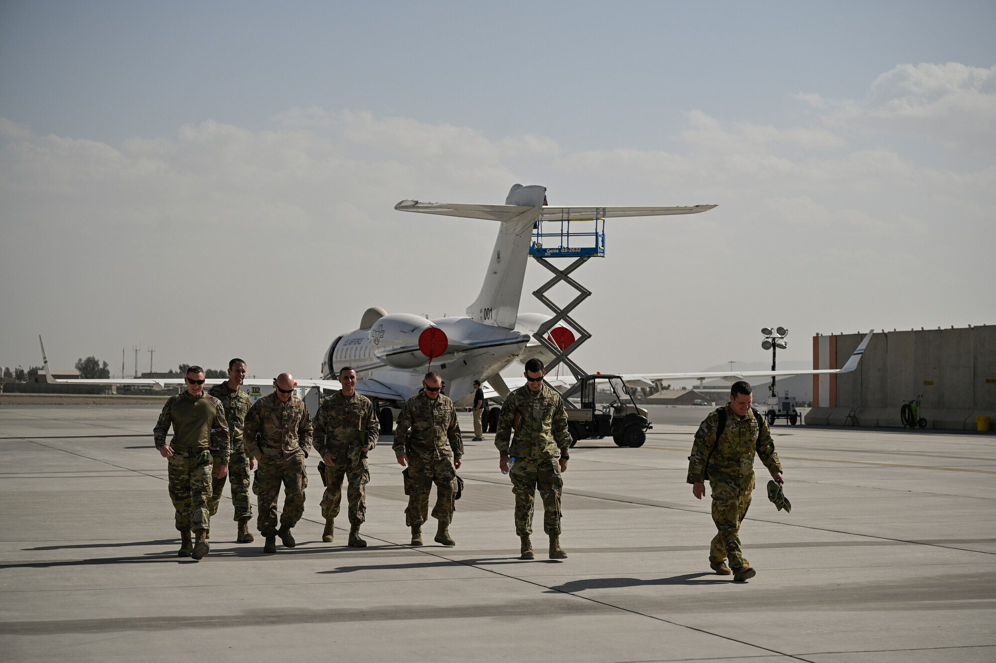 U.S. Air Force Lt. Gen. Joseph T. Guastella, Jr., Commander, U.S. Air Forces Central Command and Combined Forces Air Component Commander, and U.S. Air Force Chief Master Sgt. Shawn L. Drinkard, Command Chief Master Sgt. for USAFCENT, tour an E-11A Battle Field Airborne Communications Node assigned to the 430th Expeditionary Electronic Combat Squadron at Kandahar Airfield, Afghanistan, during a trip to KAF to talk to the Airmen about the importance of the USAFCENT mission in Afghanistan, Feb. 24, 2020.