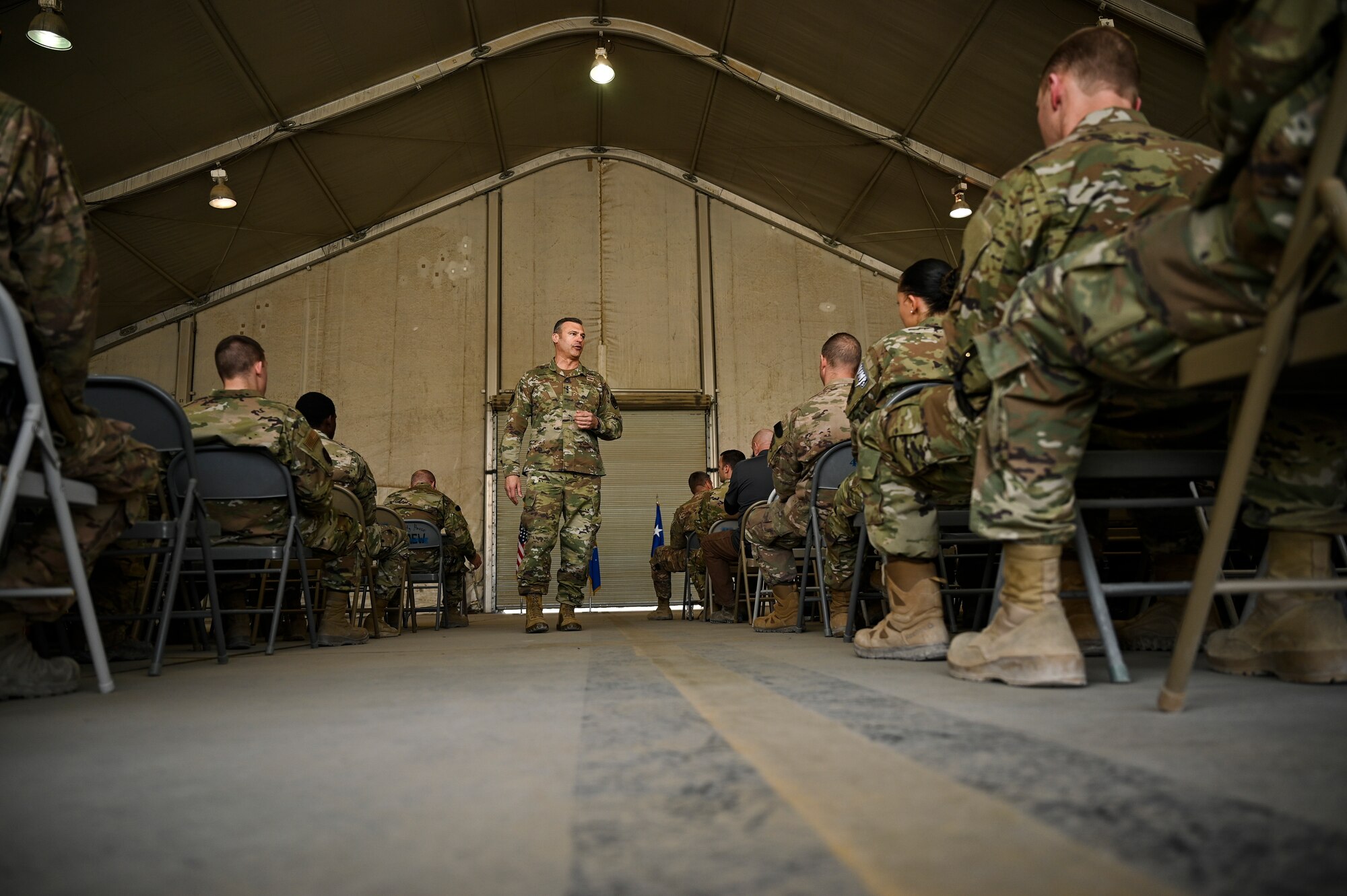 U.S. Air Force Lt. Gen. Joseph T. Guastella, Jr., Commander, U.S. Air Forces Central Command and Combined Forces Air Component Commander, speaks with 451st Air Expeditionary Group Airmen at Kandahar Airfield about the importance of the USAFCENT mission in Afghanistan, Feb. 24, 2020.