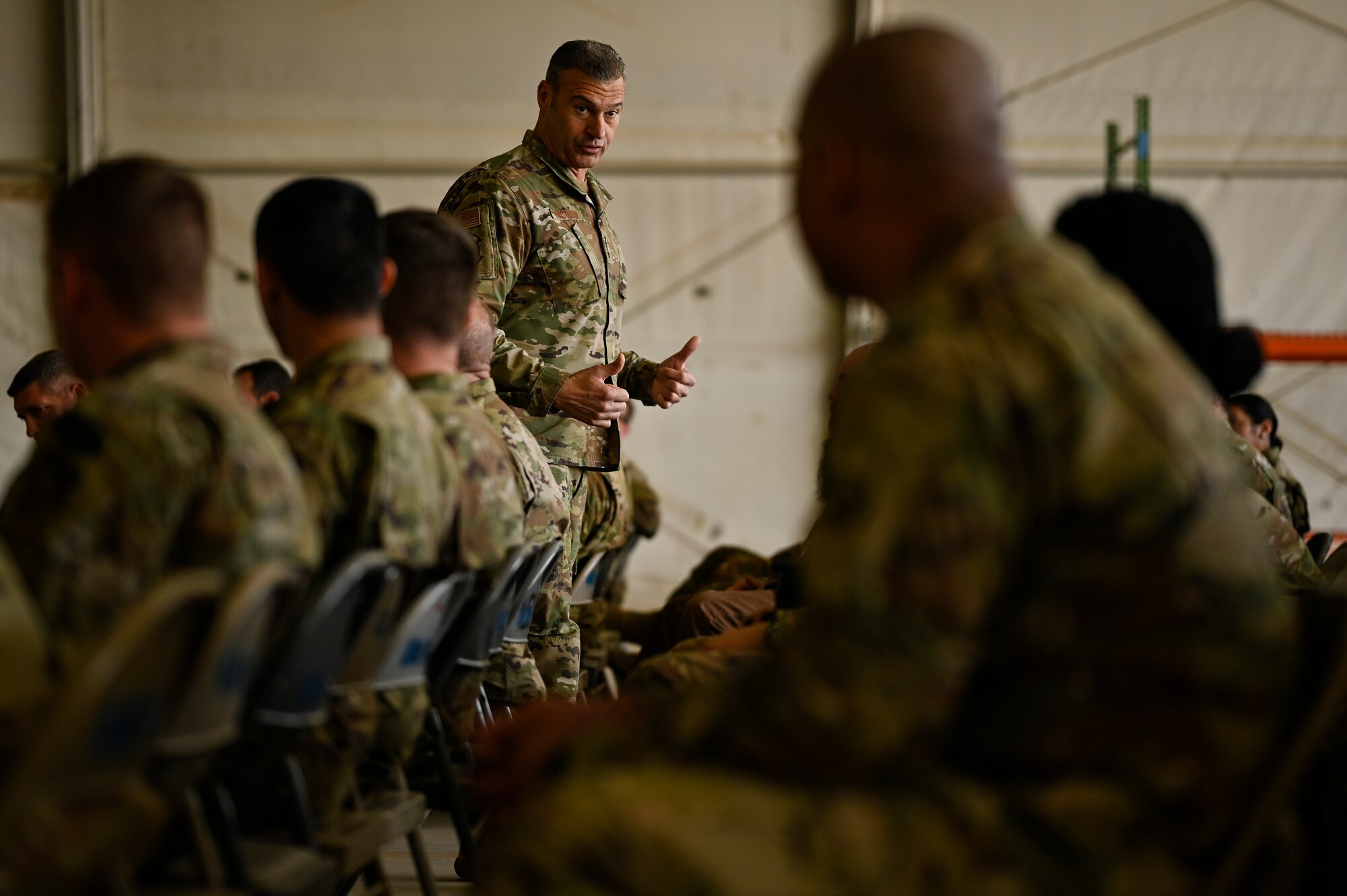 U.S. Air Force Lt. Gen. Joseph T. Guastella, Jr., Commander, U.S. Air Forces Central Command and Combined Forces Air Component Commander, speaks with 451st Air Expeditionary Group Airmen at Kandahar Airfield about the importance of the USAFCENT mission in Afghanistan, Feb. 24, 2020.