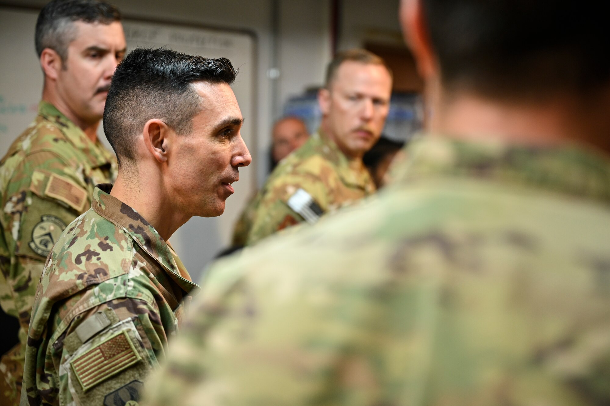 U.S. Air Force Chief Master Sgt. Shawn L. Drinkard, Command Chief Master Sgt. for USAFCENT, talks with 438th Air Expeditionary Wing Train Advise Assist Command-Air members based at Kandahar Airfield, Afghanistan about the importance of the USAFCENT mission in Afghanistan, Feb. 24, 2020.