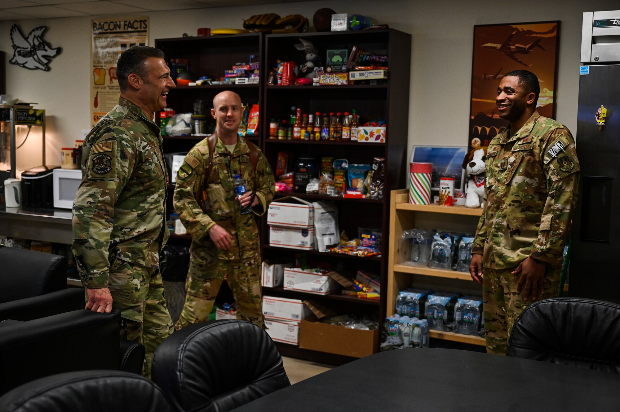 U.S. Air Force Lt. Gen. Joseph T. Guastella, Jr., Commander, U.S. Air Forces Central Command and Combined Forces Air Component Commander, talks with 430th Expeditionary Electronic Combat Squadron commander, U.S. Air Force Lt. Col. James Hayes, middle, and  U.S. Air Force Capt. Tim Jefferson, right, about the importance of the USAFCENT mission in Afghanistan at Kandahar Airfield, Afghanistan, Feb. 24, 2020.