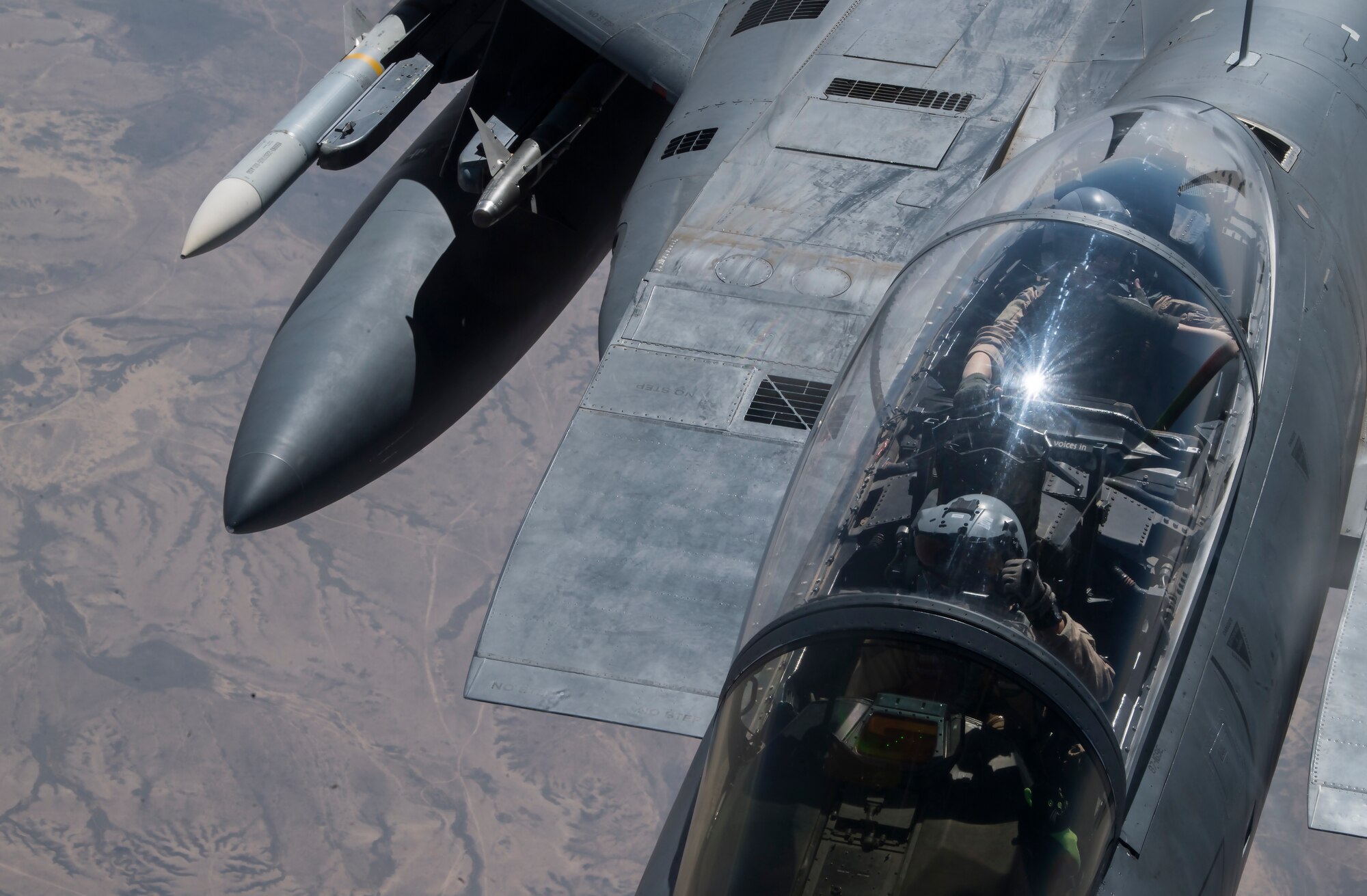 A U.S. Air Force F-15E Strike Eagle receives fuel from a U.S. Air Force KC-135 Stratotanker assigned to the 28th Expeditionary Air Refueling Squadron, over Iraq, March 11, 2020.