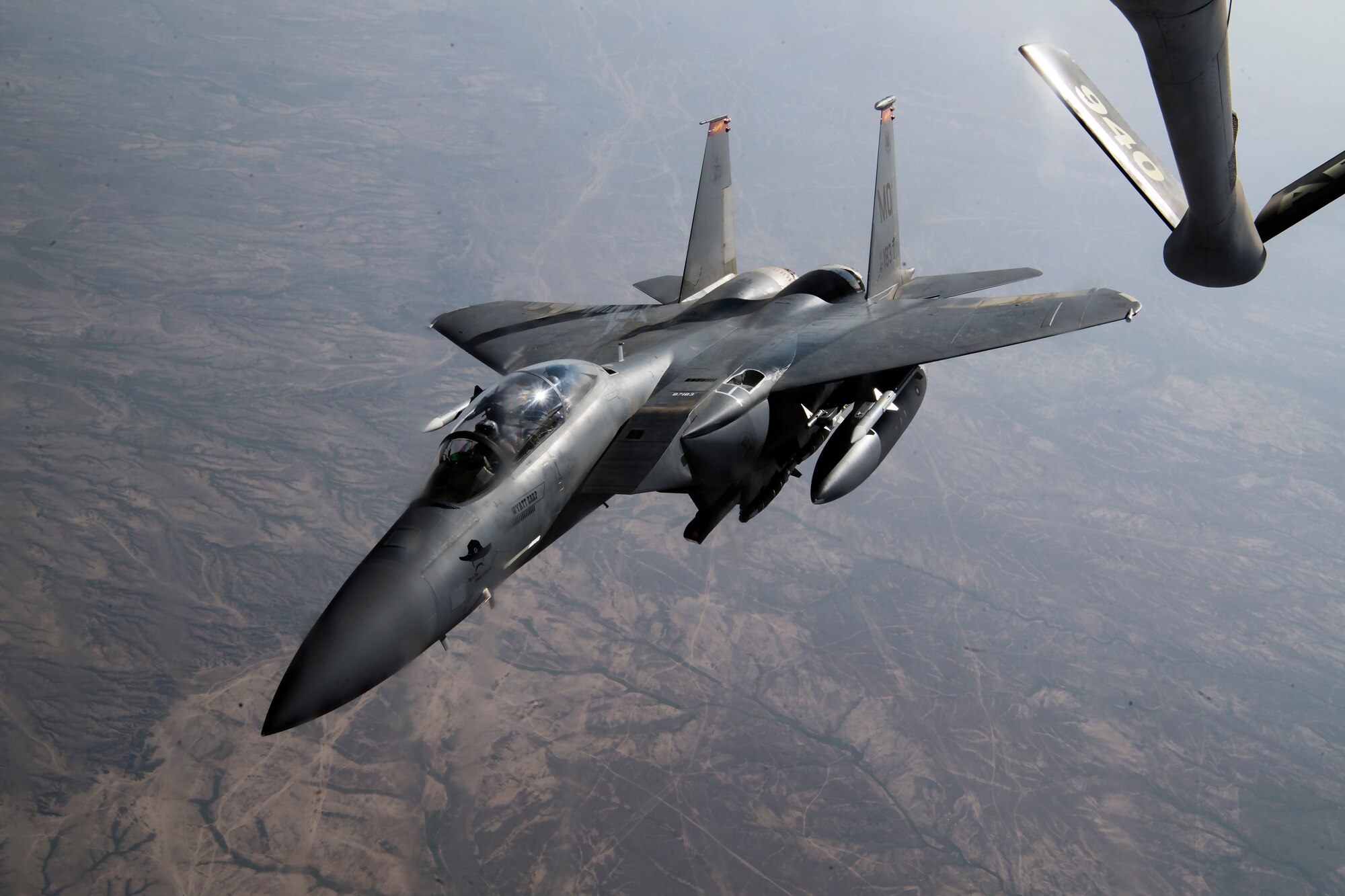 A U.S. Air Force F-15E Strike Eagle finishes an aerial refueling with a U.S. Air Force KC-135 Stratotanker assigned to the 28th Expeditionary Air Refueling Squadron, over Iraq, March 11, 2020.