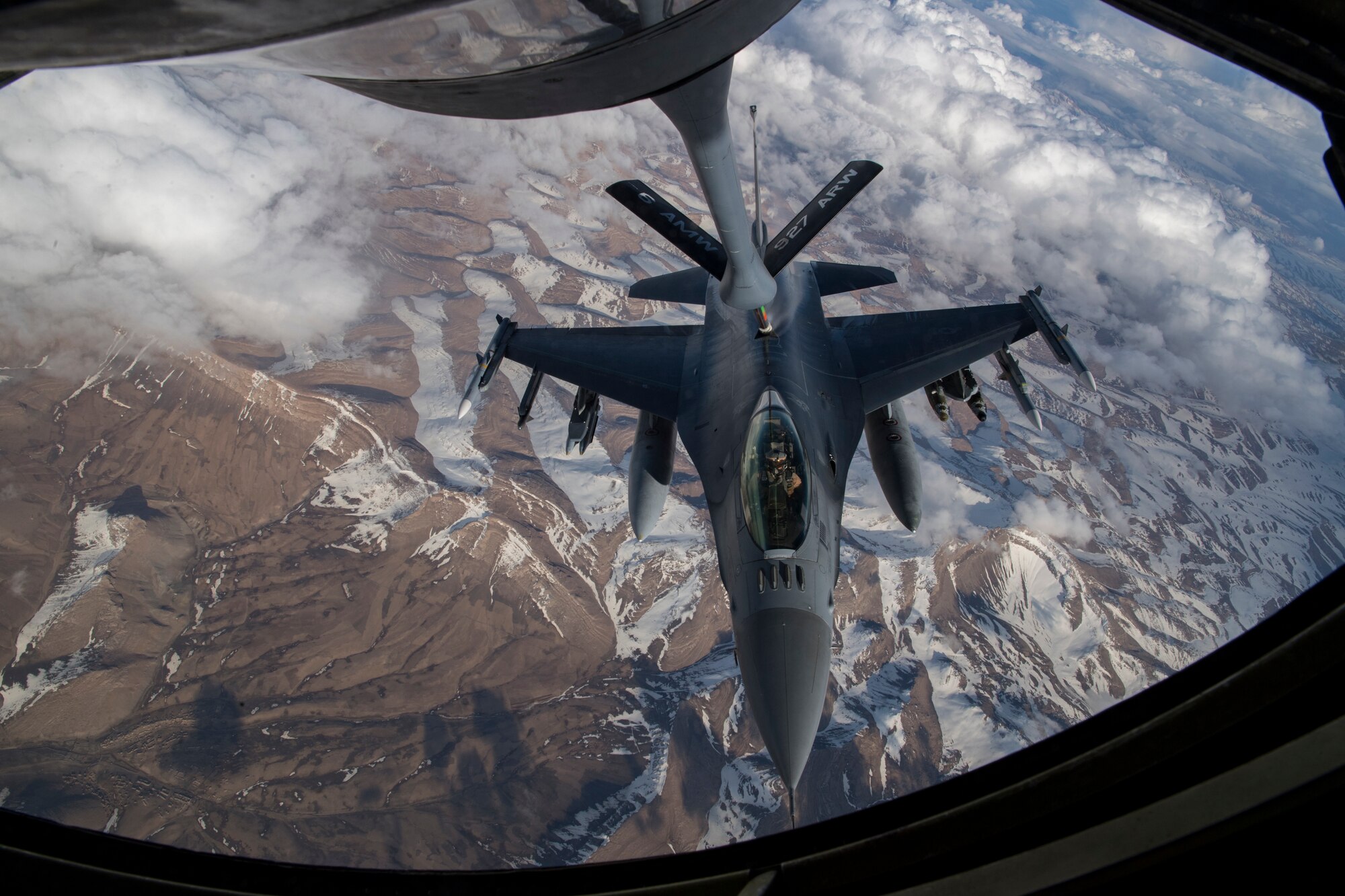 A U.S. Air Force F-16 Fighting Falcon receives fuel from a U.S. Air Force KC-135 Stratotanker assigned to the 28th Expeditionary Air Refueling Squadron over Afghanistan, March 17, 2020.