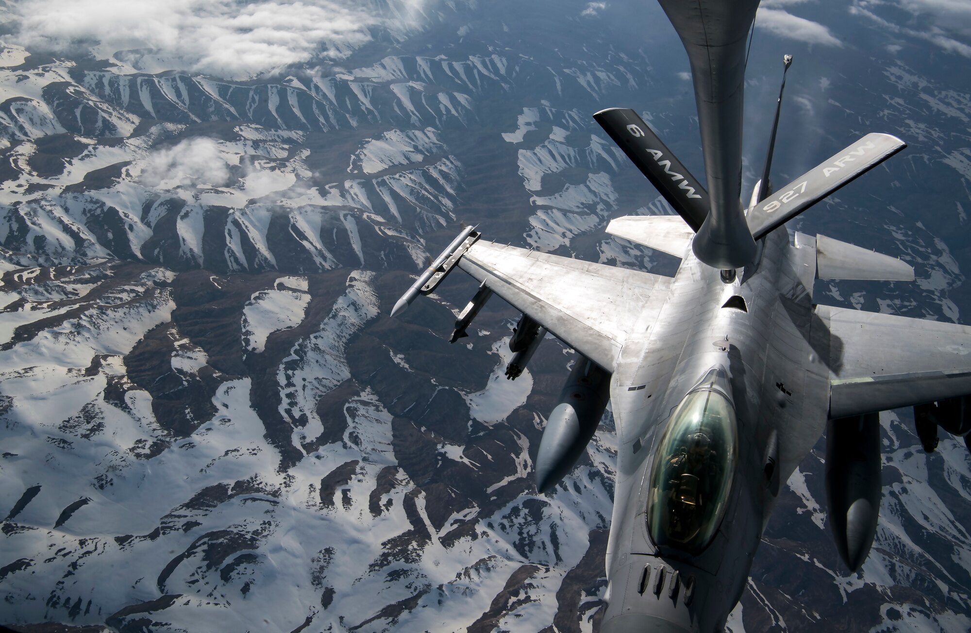 A U.S. Air Force F-16 Fighting Falcon receives fuel from a U.S. Air Force KC-135 Stratotanker assigned to the 28th Expeditionary Air Refueling Squadron over Afghanistan, March 17, 2020.