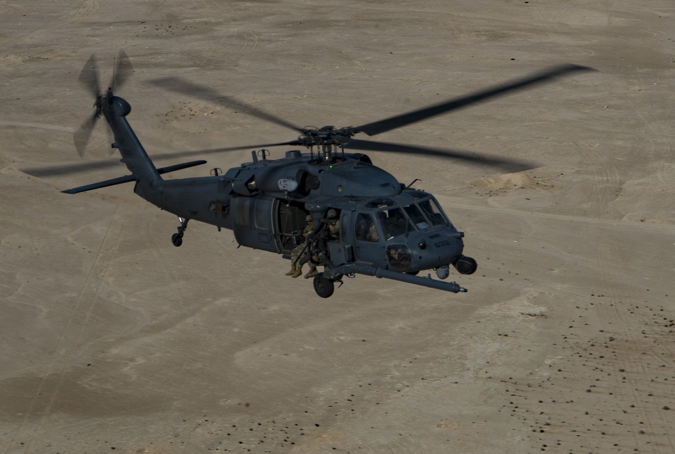 66th Expeditionary Rescue Squadron train in a HH-60G Pave Hawk over Qatar