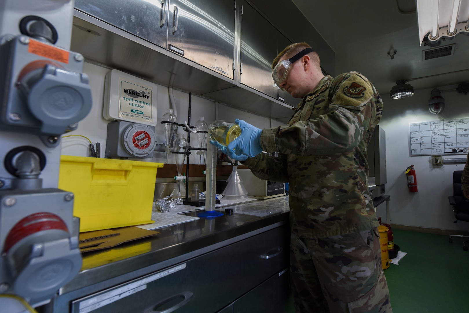 U.S. Air Force Senior Airman Cody Lane, 8th Logistics Readiness Squadron fuels laboratory technician, runs a fuel system icing inhibitor or “fizzy sample” in the fuels laboratory at Kunsan Air Base, Republic of Korea, April 3, 2020. A “fizzy sample” bonds to the water in jet fuel to prevent the water from freezing. (U.S. Air Force photo by Senior Airman Jessica Blair)