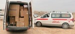Vehicles carrying medical supplies are parked for offloading during an equipment divestiture across Al-Hasakah and Al-Shaddadi prisons and hospitals in Syria, March 27th, 2020. The divestiture’s focus is to address the needs of northeast Syria’s infrastructure during the COVID-19 pandemic.