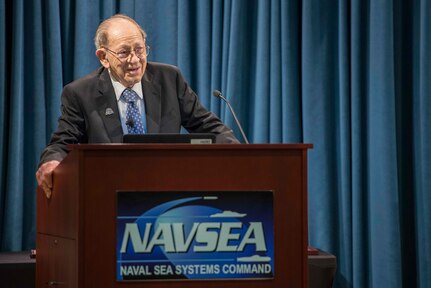 Sarkis Tatigian delivers remarks during a celebration of his 75 years of federal service at the Washington Navy Yard.