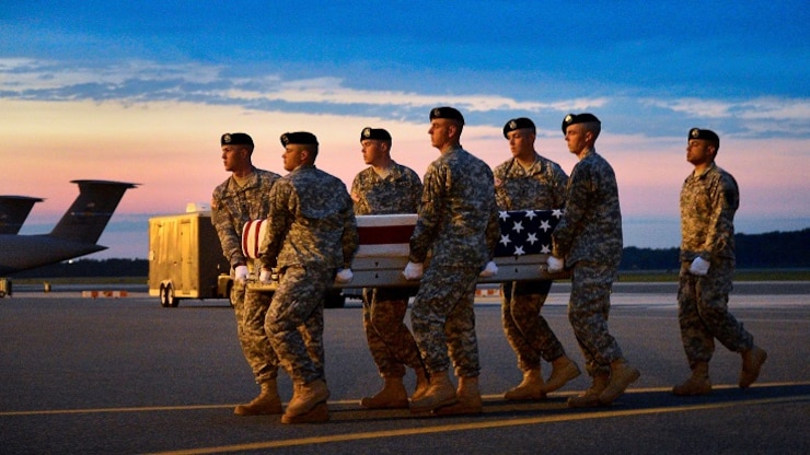 A U.S. Army carry team transfers the remains of Army Spc. Ray A. Ramirez, of Sacramento, Calif., at Dover Air Force Base, Del., June 03, 2013
