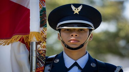 Senior Airman Erin Valderama-Harper, 96th Aircraft Maintenance Squadron, carries the Florida State flag during the Honor Guard graduation ceremony, March 6, at Eglin Air Force Base, Fla.