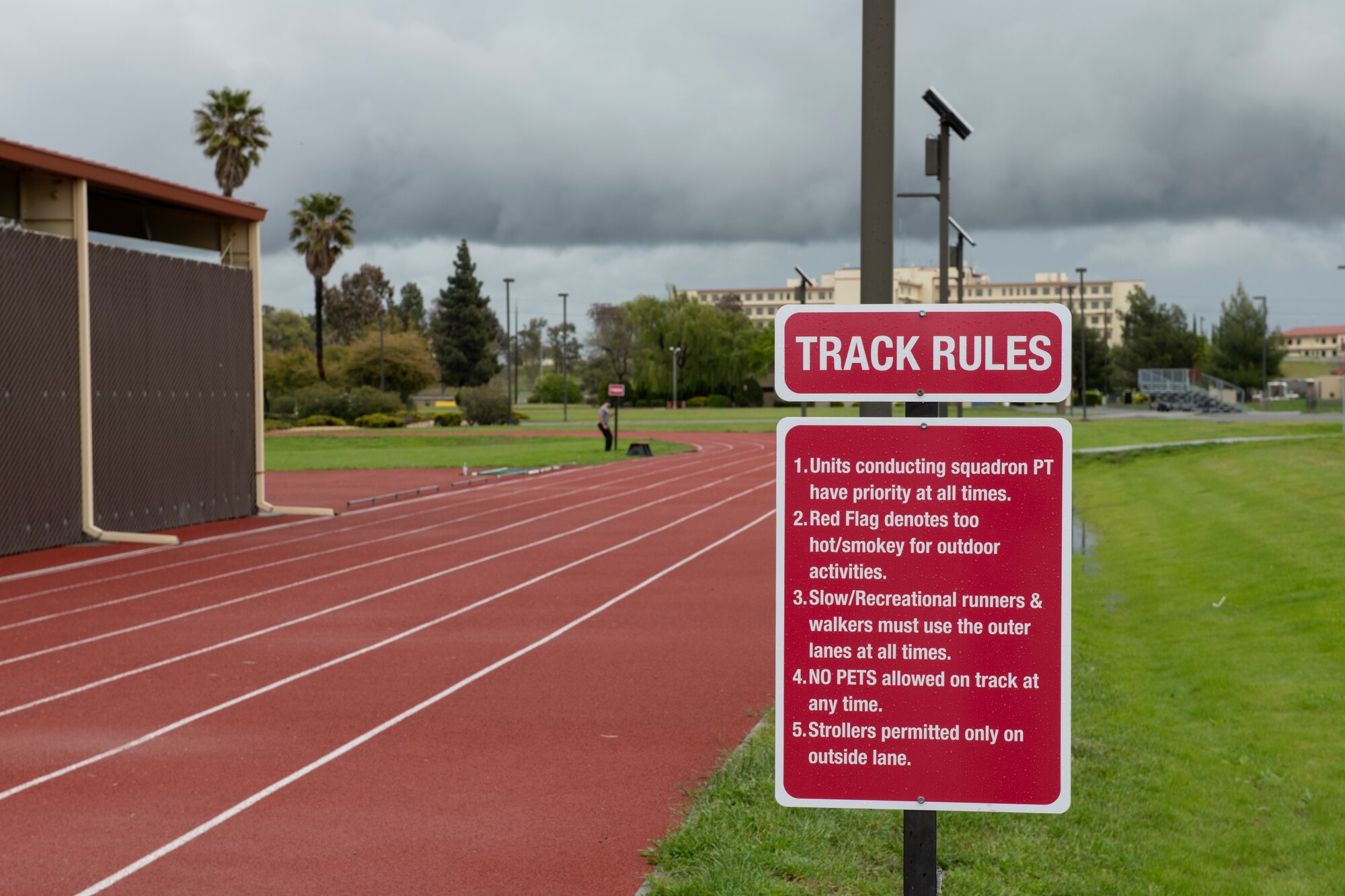 A sign displaying track rules.