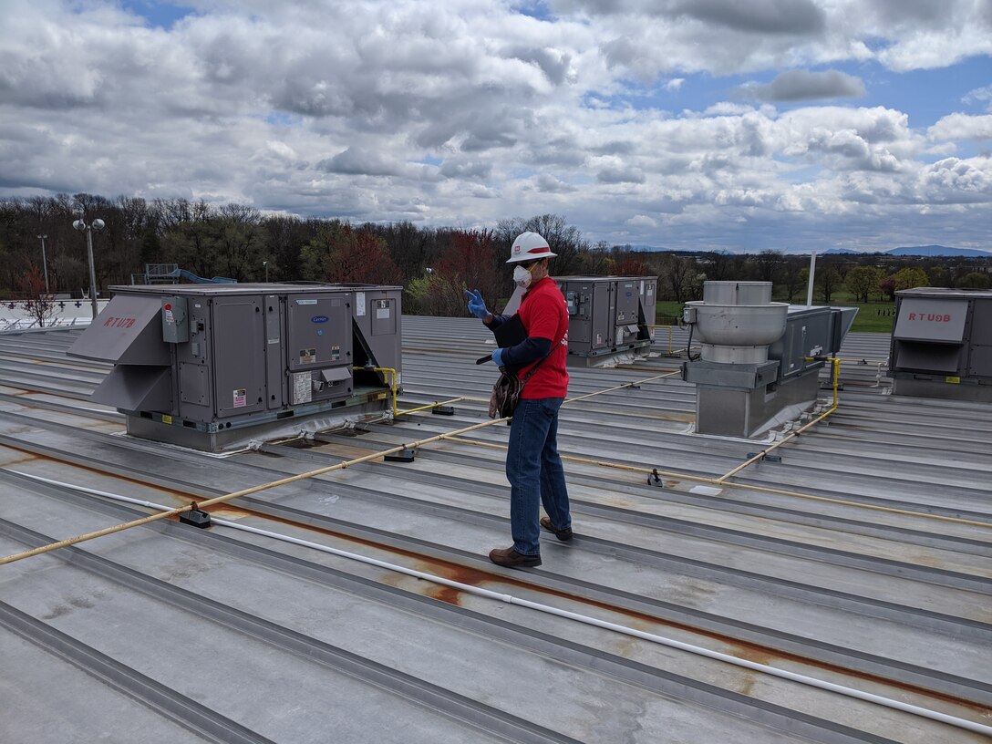 David Roldan, a mechanical engineer with the U.S. Army Corps of Engineers Transatlantic Middle East District conducts an assessment of a facility in Northern Virginia to determine its suitability for COVID-19 response. A facility assessment does not mean that a facility will be used