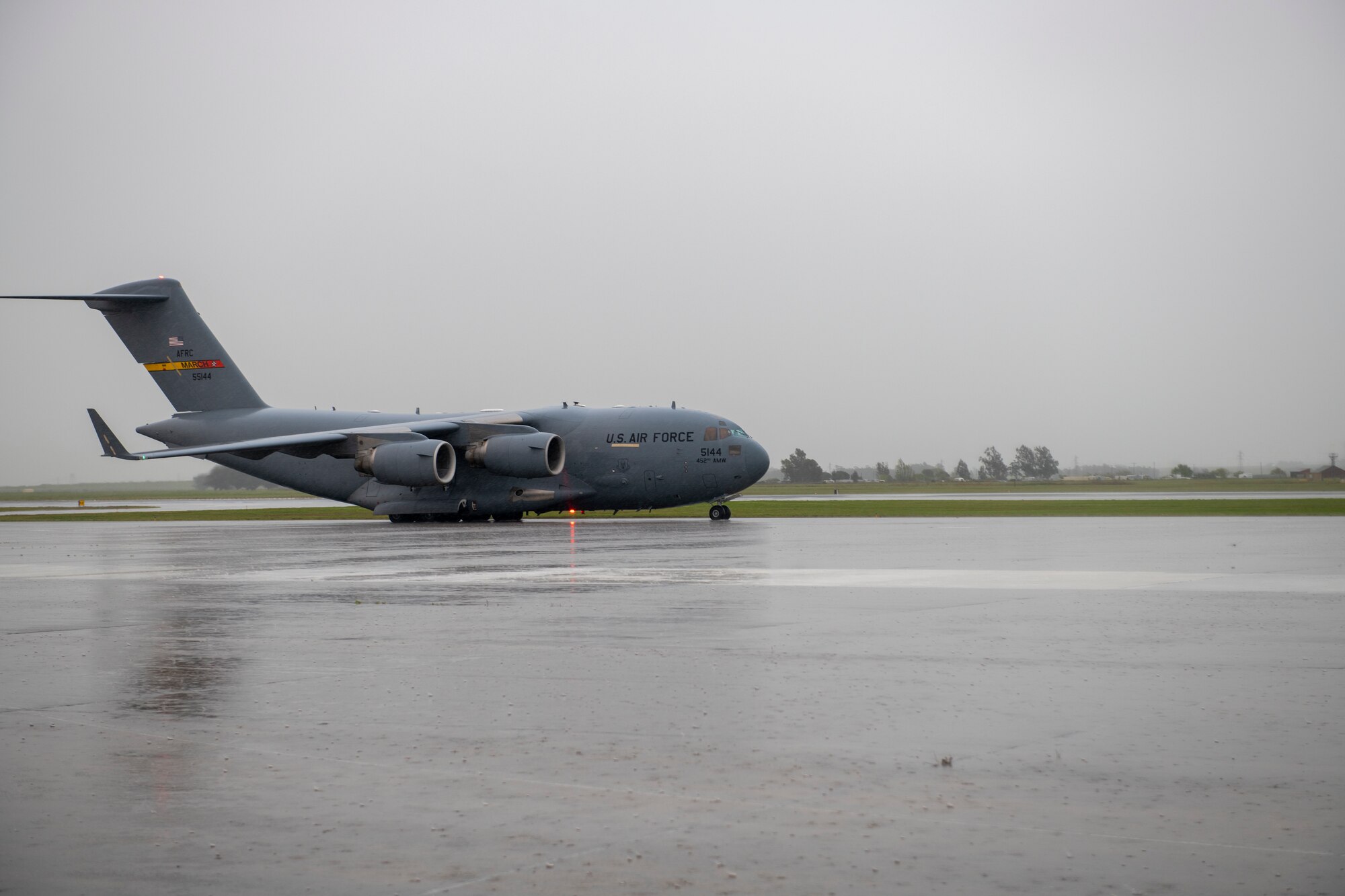 A C-17 taxis on the flight line.