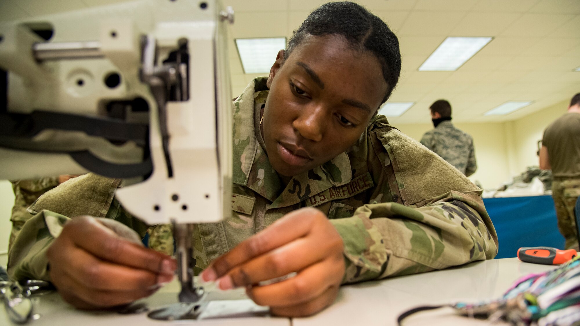 Sheppard Airmen make cloth face covers to combat COVID-19.