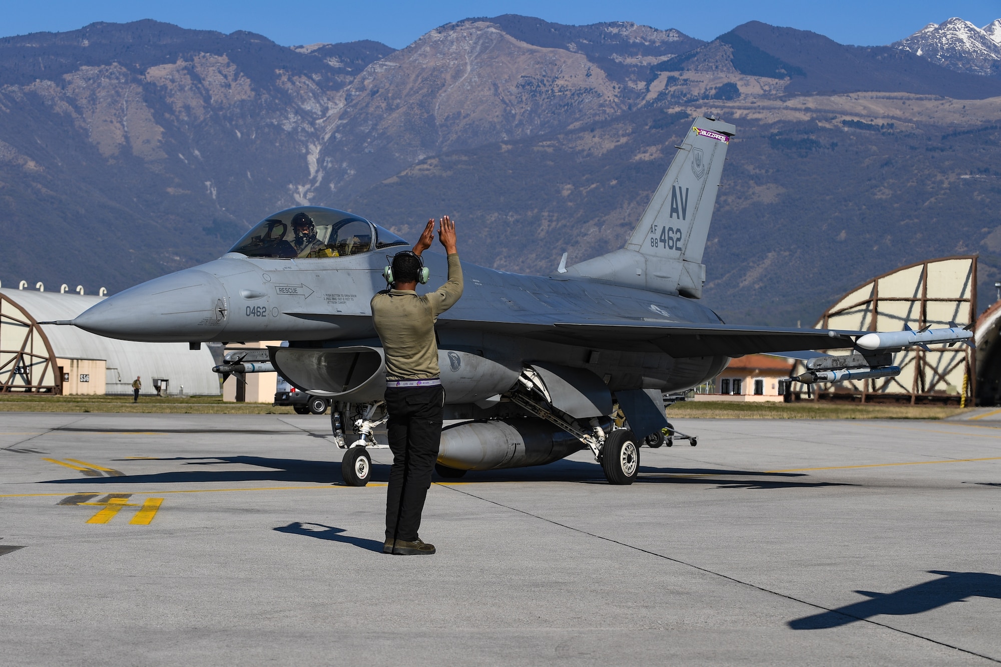 U.S. Air Force Airman Jaquinton Stewart, crew chief for the 510th Fighter Squadron, marshals a U.S. Air Force F-16 Fighting Falcon prior to take off at Aviano Air Base, Italy, Apr. 7, 2020. The 510th FS provides combat airpower on demand to U.S. and NATO Combatant Commanders as well as the National Command Authority in order to meet National Security objectives. (U.S. Air Force photo by Airman Thomas S. Keisler IV)