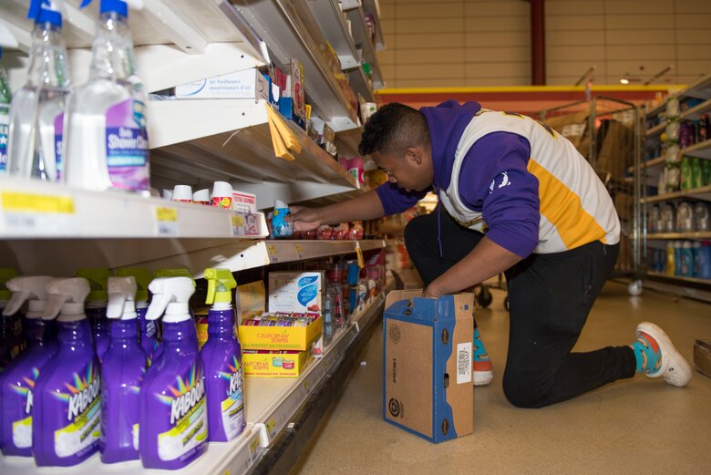 RAF Alconbury and RAF Molesworth employees and volunteers restock shelves at the base commissary at RAF Alconbury England, March 20, 2020. Volunteers answered the call to support the community to ensure service members and their families had access to essential items amid COVID-19. (U.S. Air Force photo by Airman 1st Class Jennifer Zima)