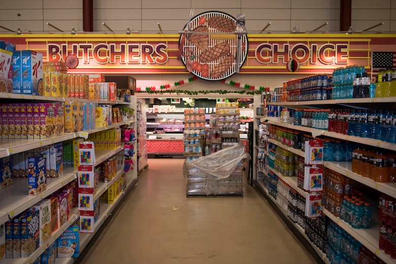 RAF Alconbury and RAF Molesworth employees and volunteers restock shelves at the base commissary at RAF Alconbury England, March 20, 2020. Volunteers answered the call to support the community to ensure service members and their families had access to essential items amid COVID-19. (U.S. Air Force photo by Airman 1st Class Jennifer Zima)