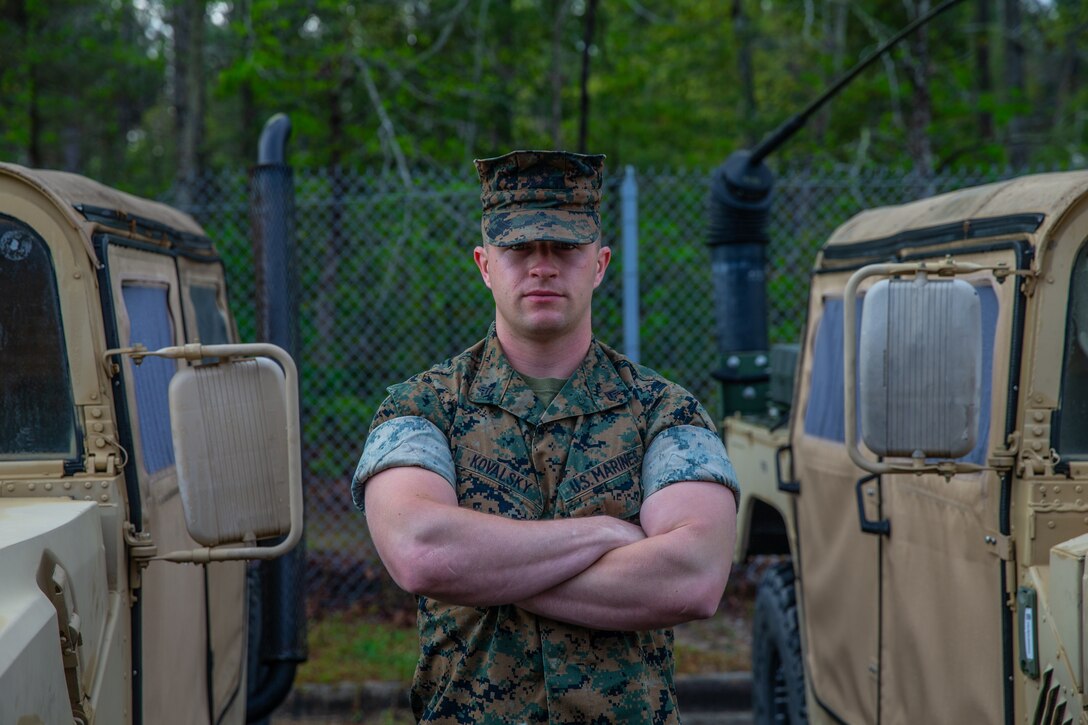 Cpl. Carter Kovalsky, barracks and facilities manager with 2nd Radio Battalion, II Marine Expeditionary Force Information Group, poses for a photo at Camp Lejeune, N.C., April 7, 2020. "Don't follow the crowd; let the crowd follow you," said Kovalsky, a Orlando, native. According to his leadership, Kovalsky has been the go-to Marine in his battalion and has shown that he is able to handle any situation that is presented to him. (U.S. Marine Corps photo by Lance Cpl. Haley McMenamin)