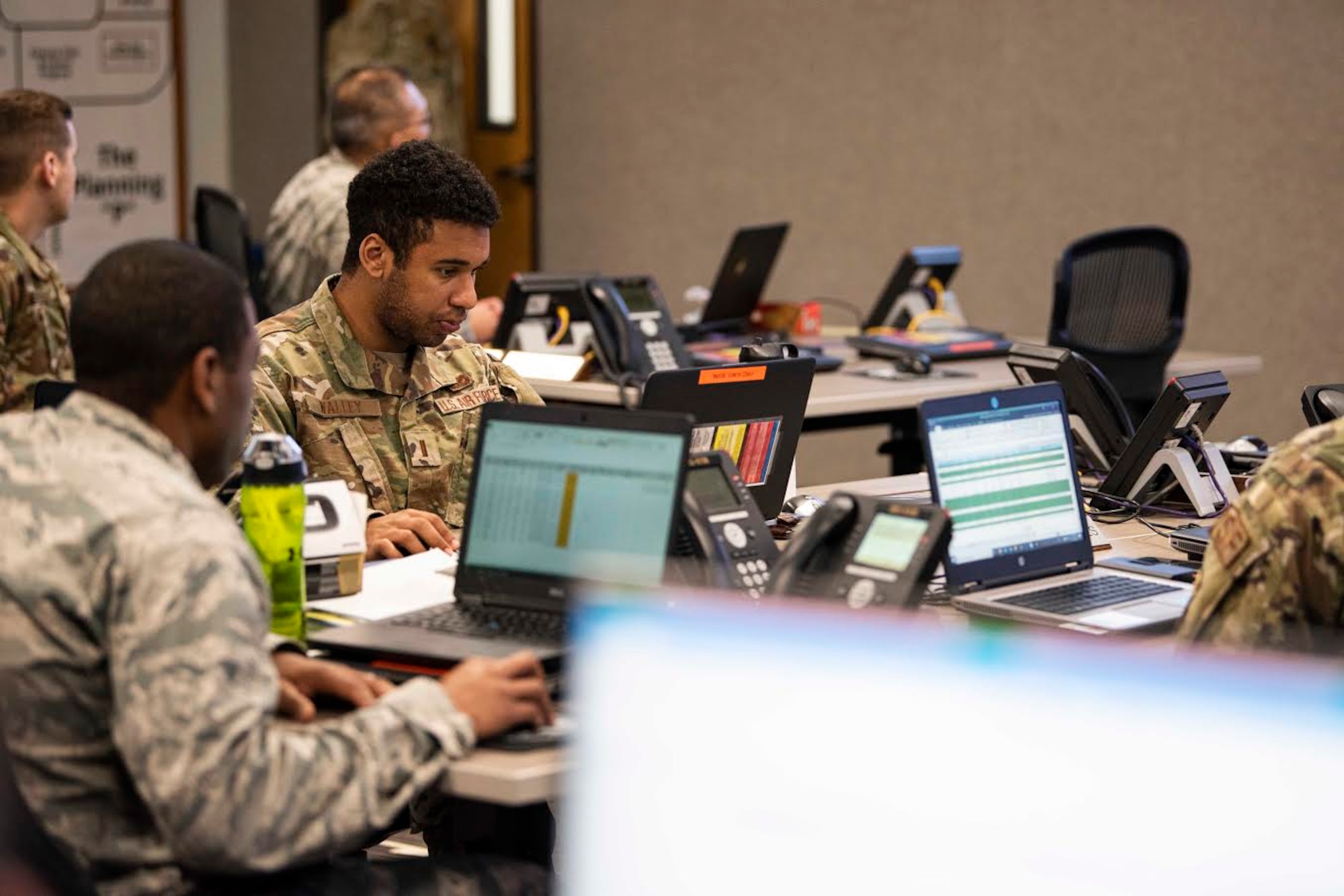 Members from across the installation participate in an Emergency Operation Center meeting March 31, 2020, at Vandenberg Air Force Base, Calif. Each subject matter experts ensure the base commander is briefed on the resources needed to mitigate the spread of COVID-19. (U.S. Air Force photo by Airman 1st Class Hanah Abercrombie)