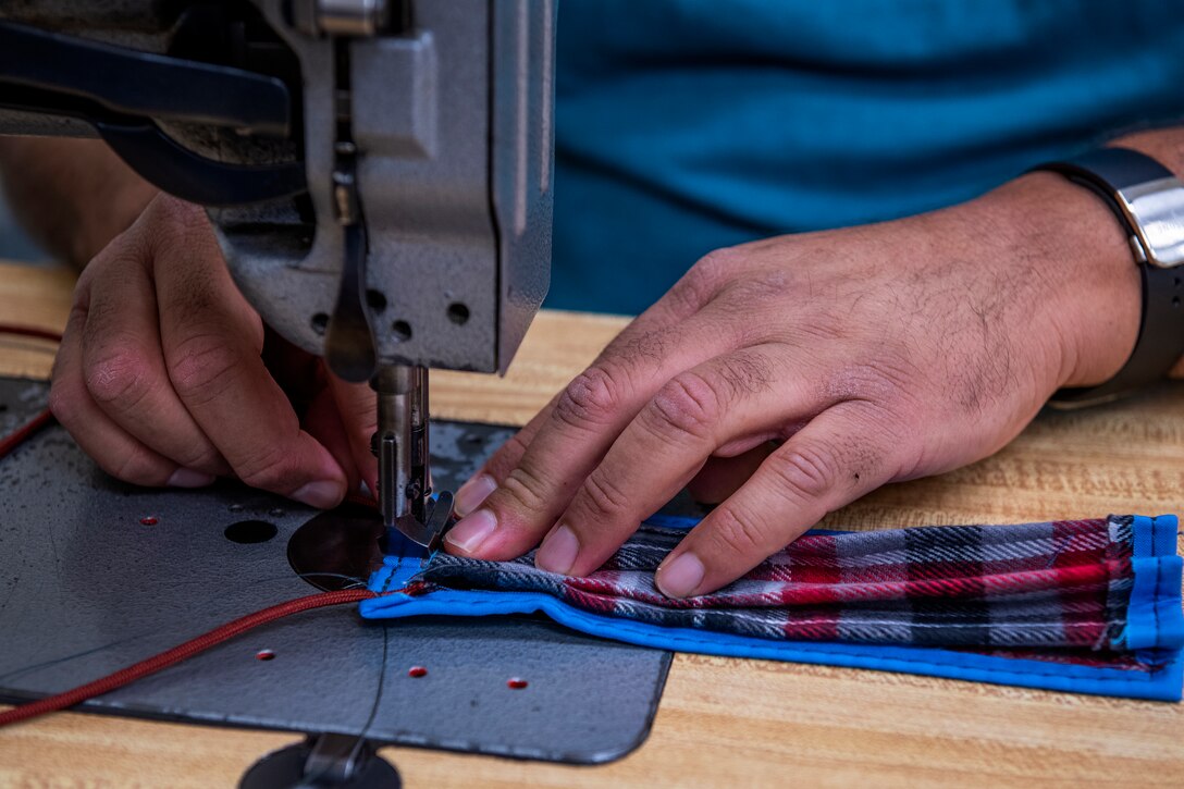 ALTUS AIR FORCE BASE, Okla. - Dan Rodriguez, an Air Crew Flight Equipment (AFE) repairman with the 97th Operations Support Squadron, sews face masks for base members, April 6, 2020 at Altus Air Force Base Oklahoma