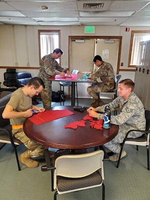 Airmen from the 735th Air Mobility Squadron provide Rapid Global Mobility in the Indo-Pacific region, but in their spare time, they are also volunteering to make masks in response to COVID-19 at Joint Base Pearl Harbor-Hickam, Hawaii. Volunteering to make masks helps the Airmen feel they are giving back