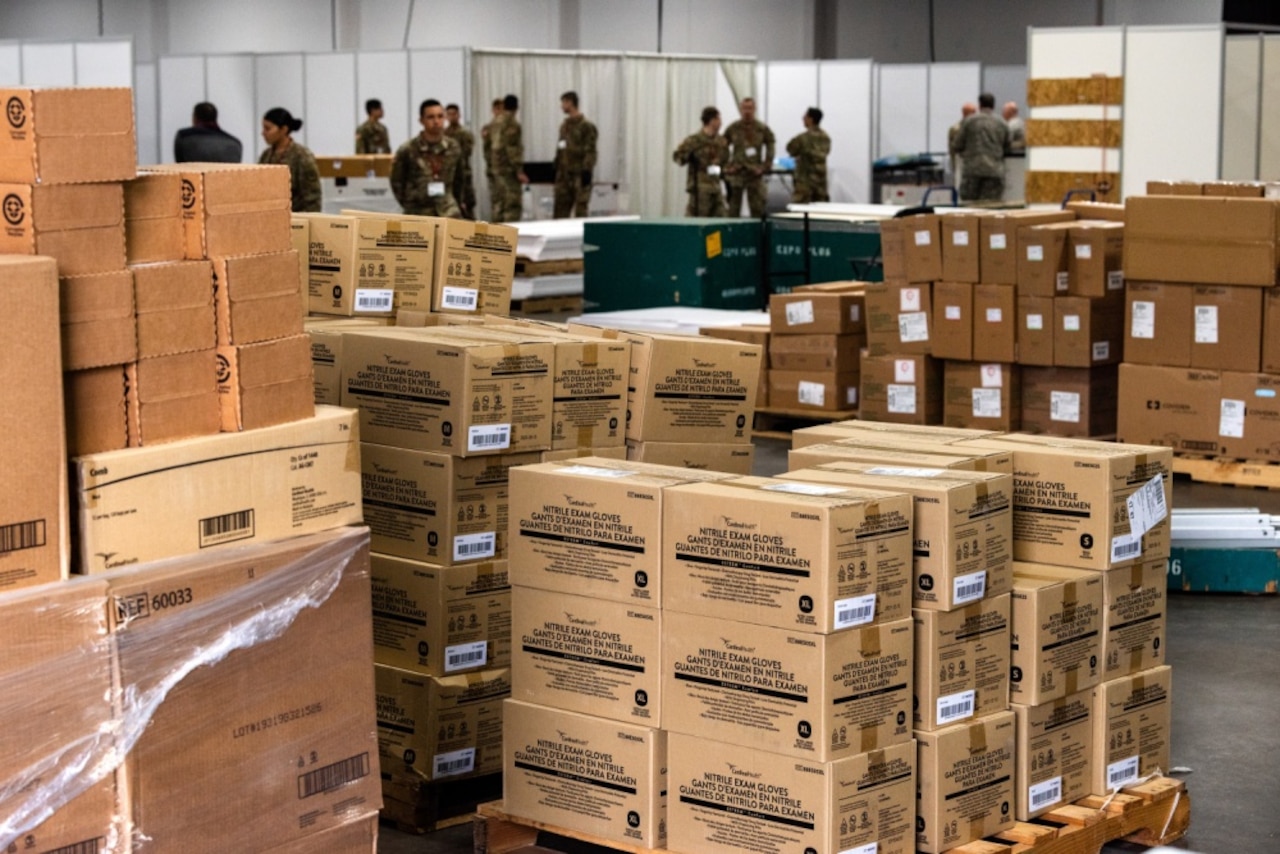 Pallets are stacked with cardboard boxes.