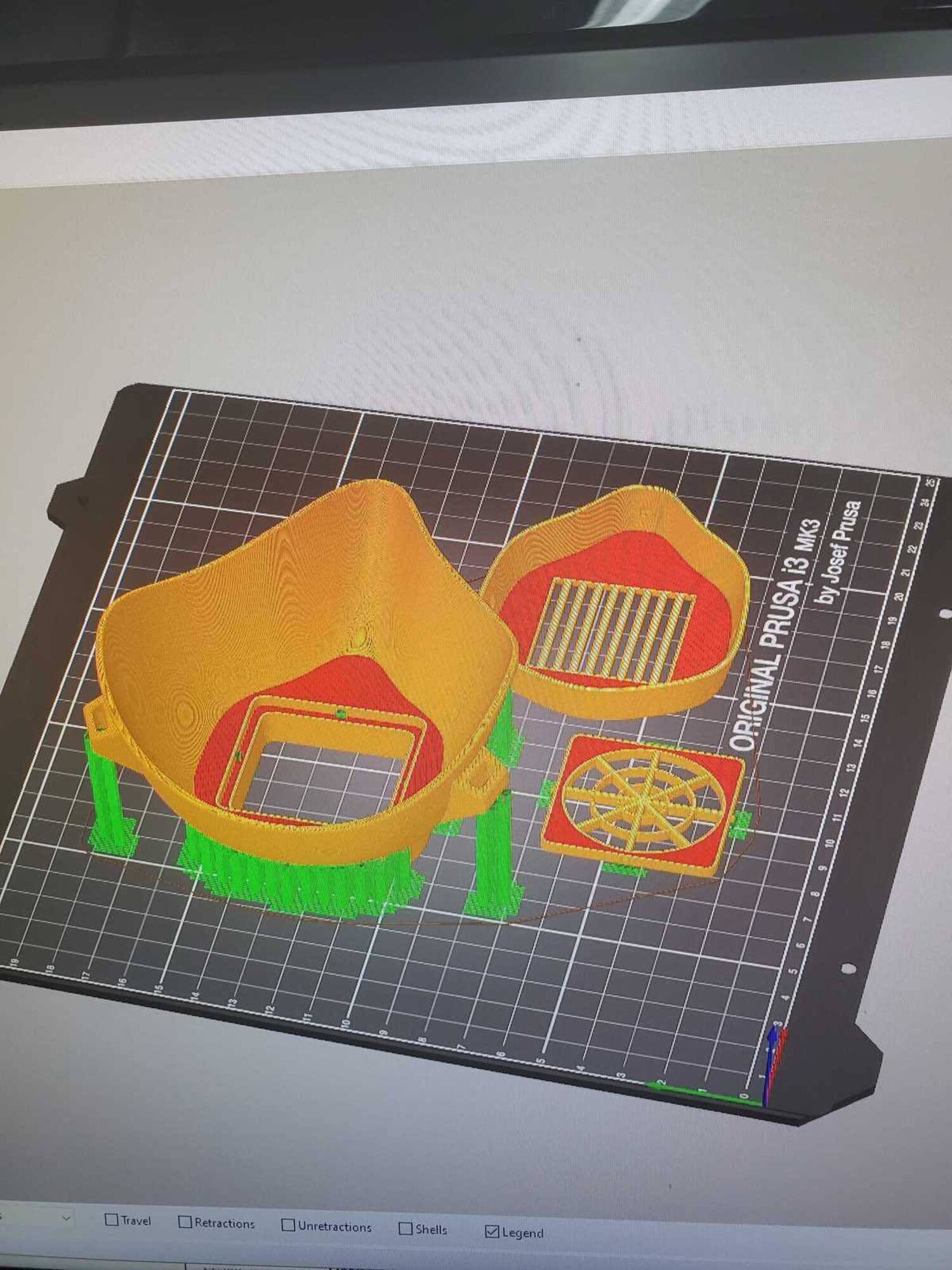 A computer screen displays a 3D print design of a protective face mask at Travis Air Force Base, California. The 60th Air Mobility Wing Phoenix Spark innovation cell has been working with other base organizations, the 60th Aerospace Medicine Squadron bioenvironmental engineering flight and the 60th Maintenance Squadron fabrication flight, since the beginning of March to deliver innovation personal protective equipment to Airmen amidst COVID-19. (courtesy photo)