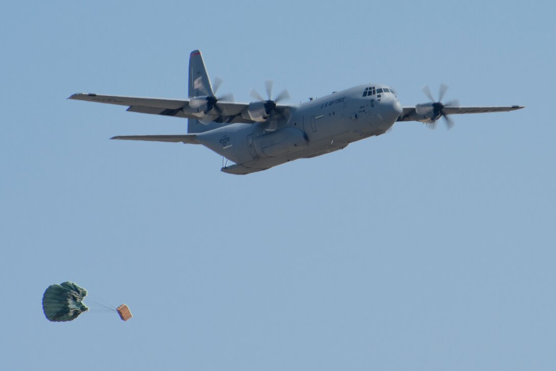 A 36th Airlift Squadron C‐130J Super Hercules performs an airdrop during the Yokota C‐130J Tactics Rodeo at Yokota Air Base, Japan, April 3, 2020.