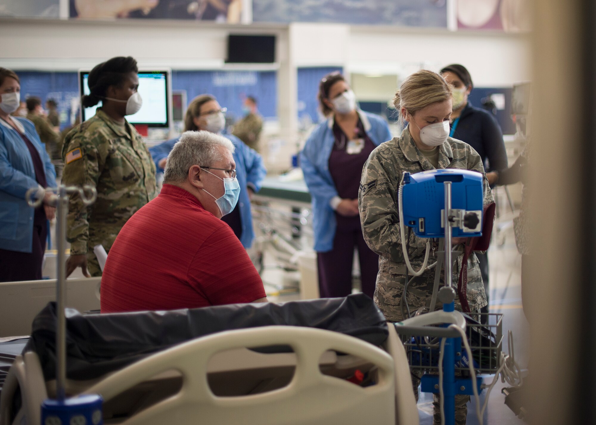 Citizen Airmen, Soldiers and medical staff from Nemours/Alfred I. DuPont Hospital for Children, Christiana Care, and St. Francis Healthcare provide basic medical care during a training exercise at an alternate care site at A.I. DuPont Hospital, Wilmington, Del., April 7, 2020. The alternate care site at A.I. DuPont Hospital marked the first alternative acute care site in Delaware as part of the nationwide federal and state efforts in preparation for the COVID-19 pandemic. (U.S. Air National Guard Photo by Staff Sgt. Katherine Miller)