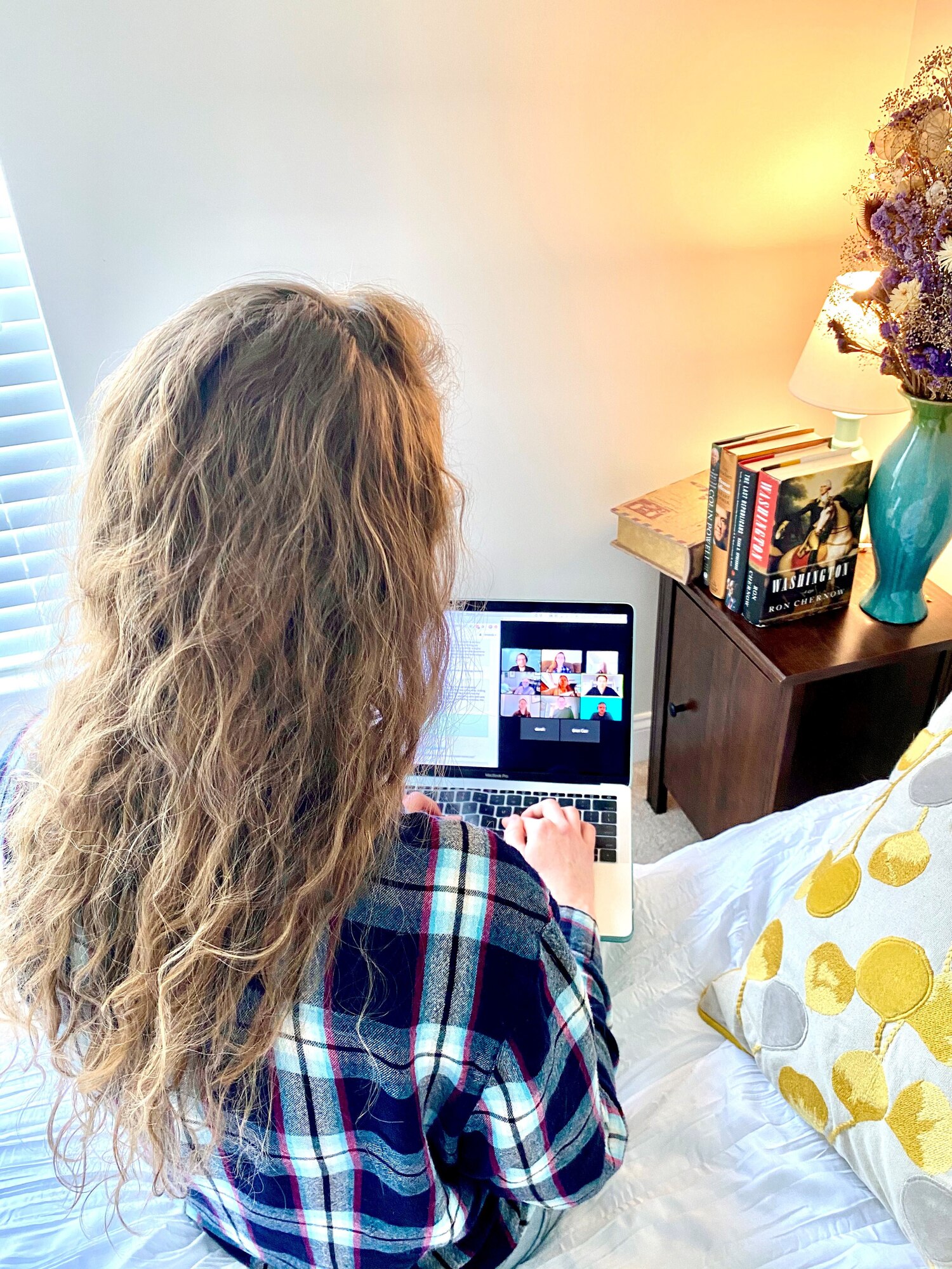 Capt. Amanda Rebhi, Program Executive Office for Digital commander's action group chief and innovation director, participates in virtual judging for The U.S. Air Force Lab with MassChallenge from her home in Massachusetts April 8.