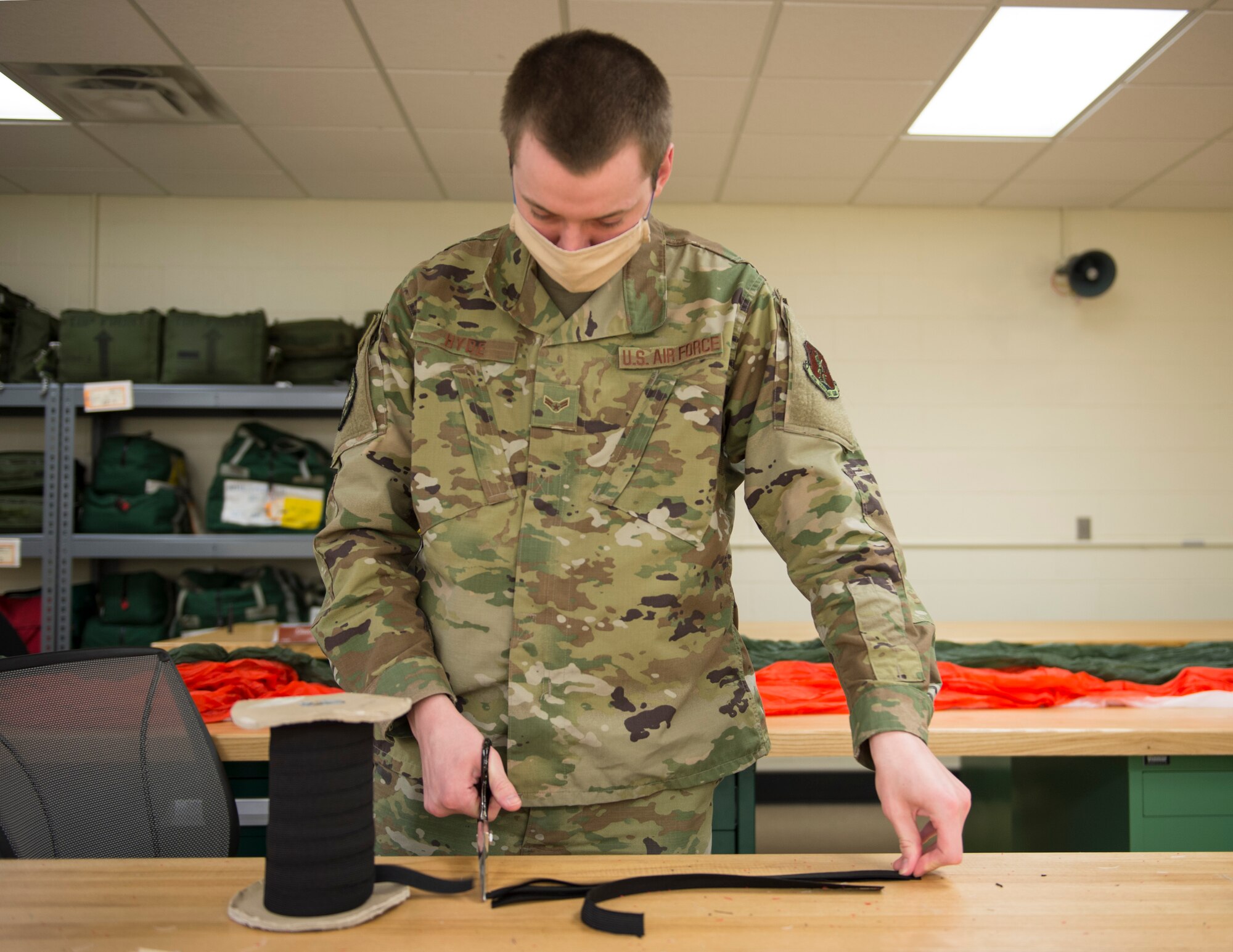 U.S. Air Force Airmen from the 133rd Operation Support Squadron’s aircrew flight equipment shop make masks for base personal in St. Paul, Minn., Apr. 8, 2020.