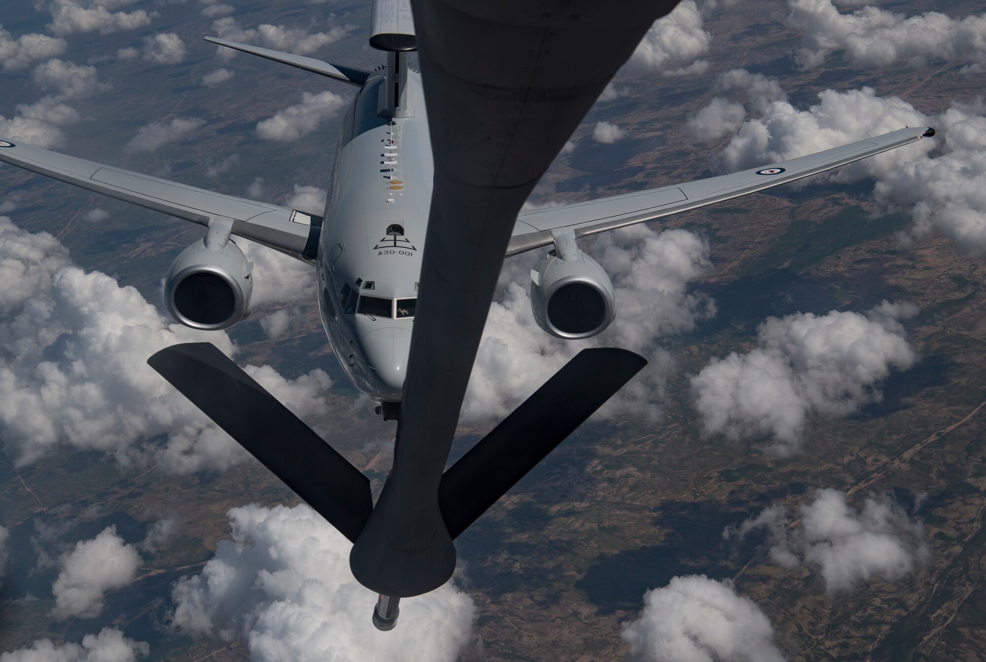 A Royal Australian Air Force E-7A Wedgetail approaches a U.S. Air Force KC-135 Stratotanker to conduct an aerial refueling operation above Iraq, April 2, 2020.