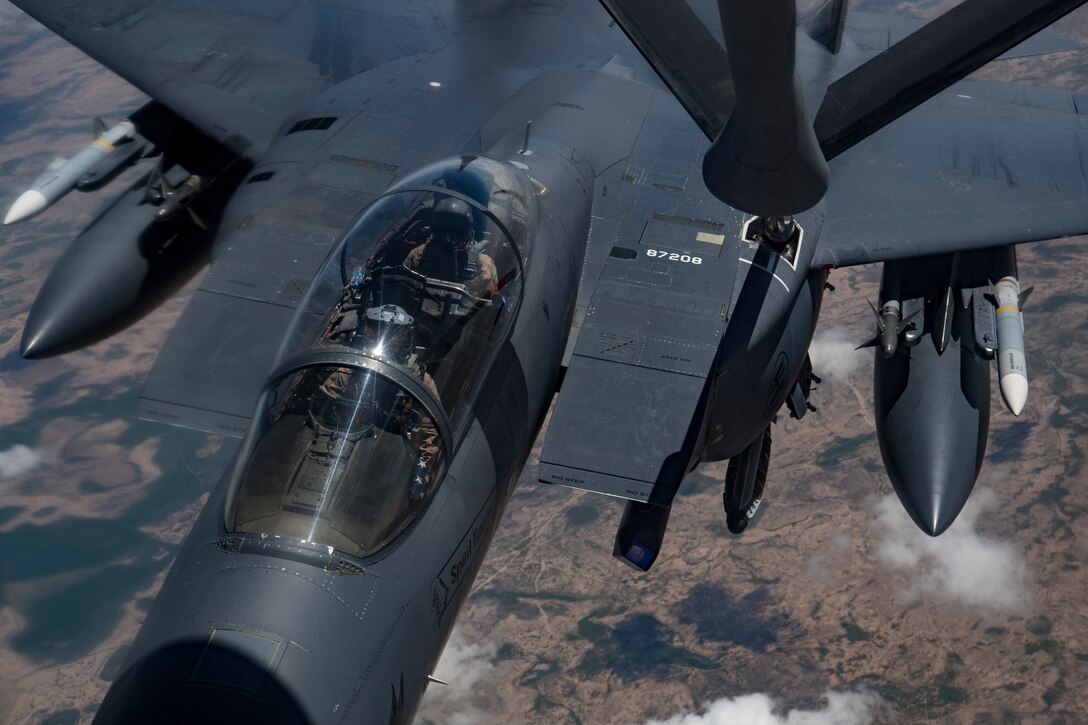 A U.S. Air Force KC-135 Stratotanker refuels a U.S. Air Force F-15E Strike Eagle above Iraq, April 2, 2020.