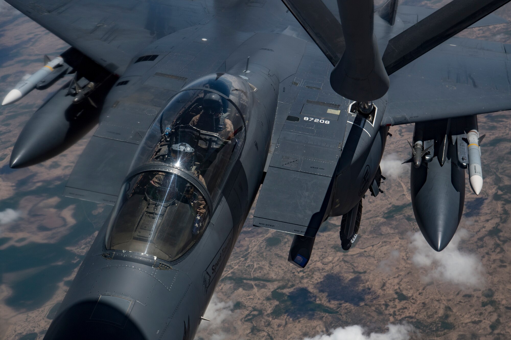 A U.S. Air Force KC-135 Stratotanker refuels a U.S. Air Force F-15E Strike Eagle above Iraq, April 2, 2020.
