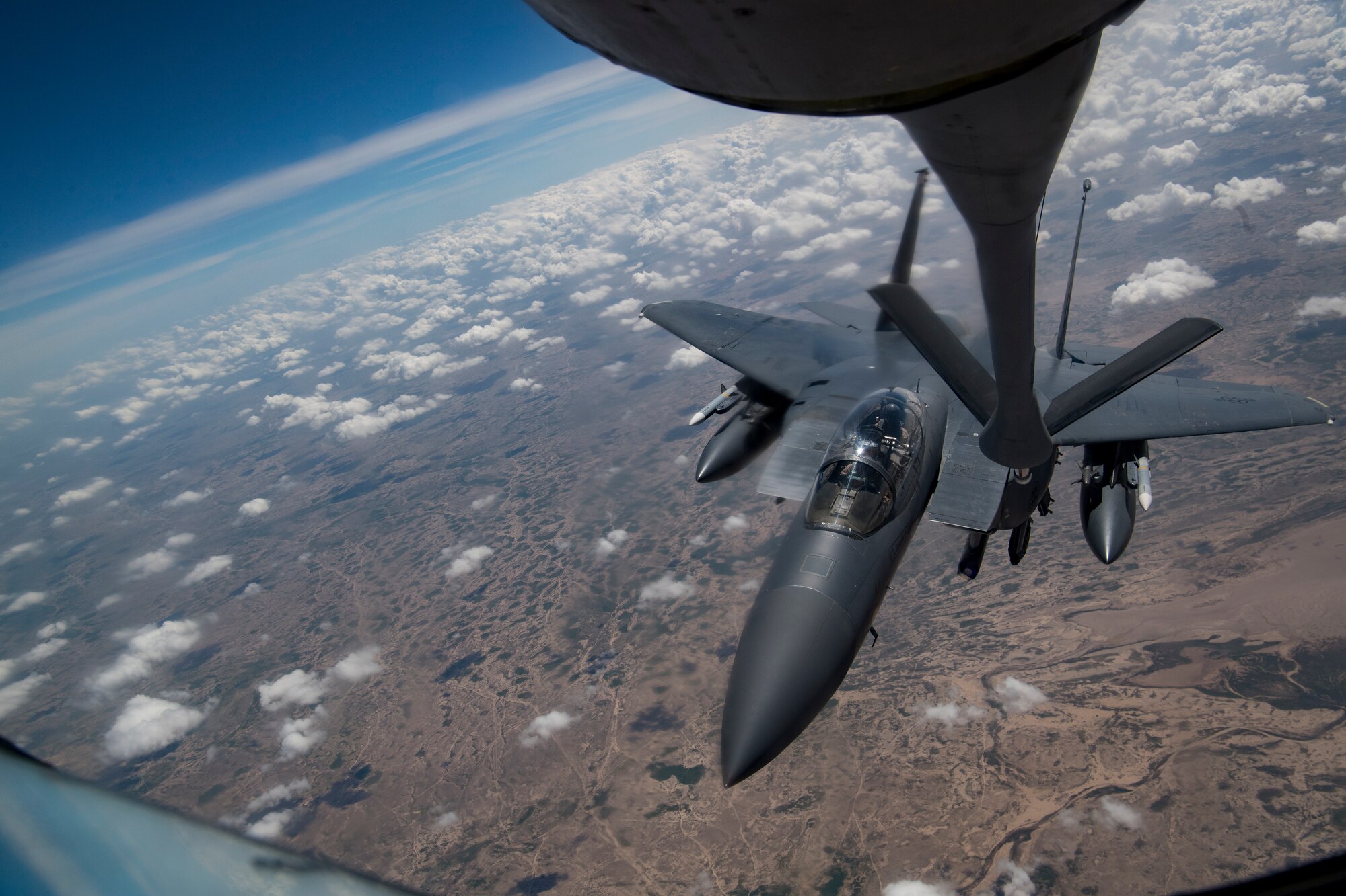 A U.S. Air Force KC-135 Stratotanker refuels a U.S. Air Force F-15E Strike Eagle above Iraq, April 2, 2020.