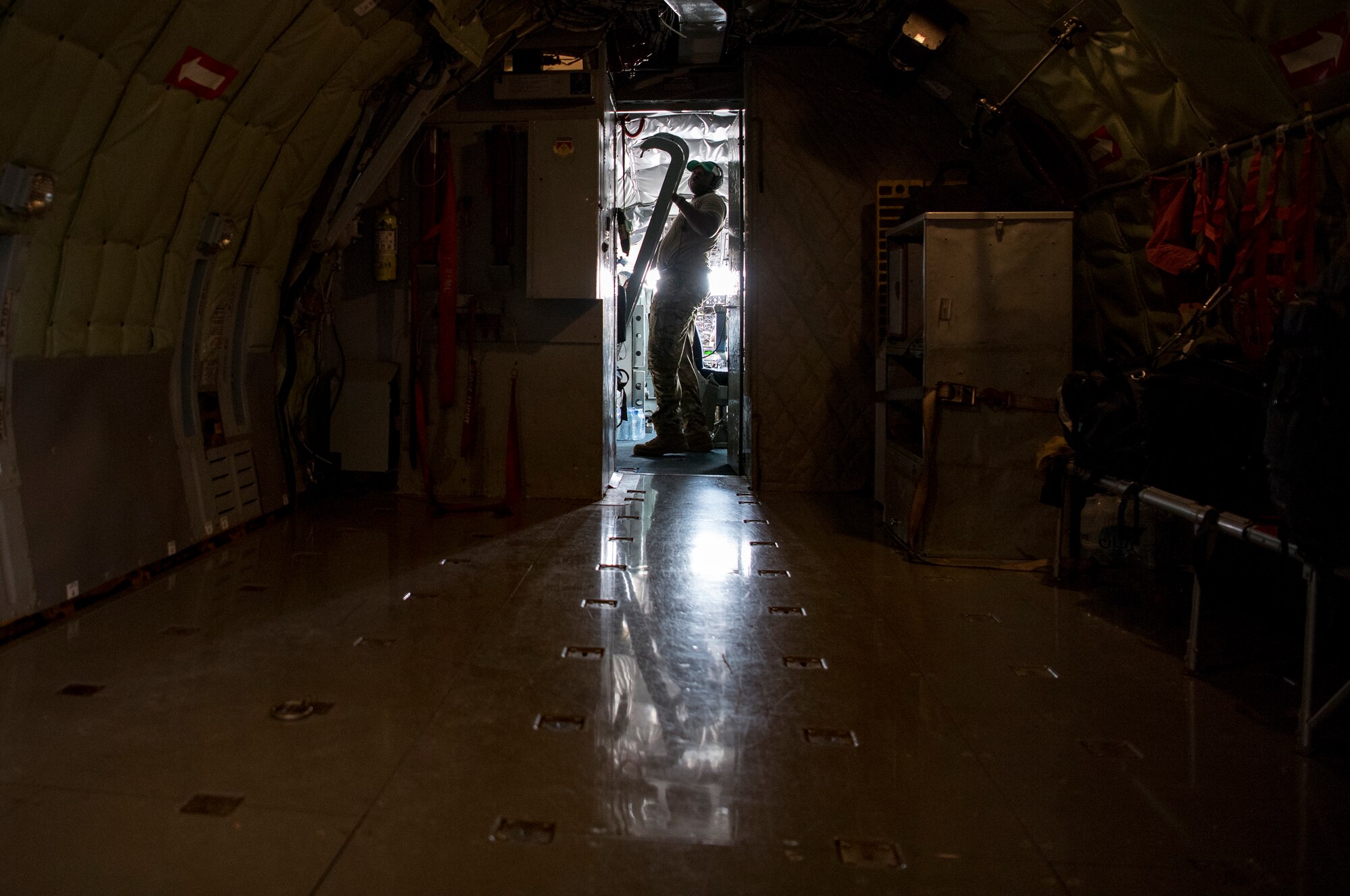 A U.S. Air Force KC-135 Stratotanker in-flight refueling specialist assigned to the 28th Expeditionary Air Refueling Squadron conducts preflight checklists at Al Udeid Air Base, Qatar, April 2, 2020.