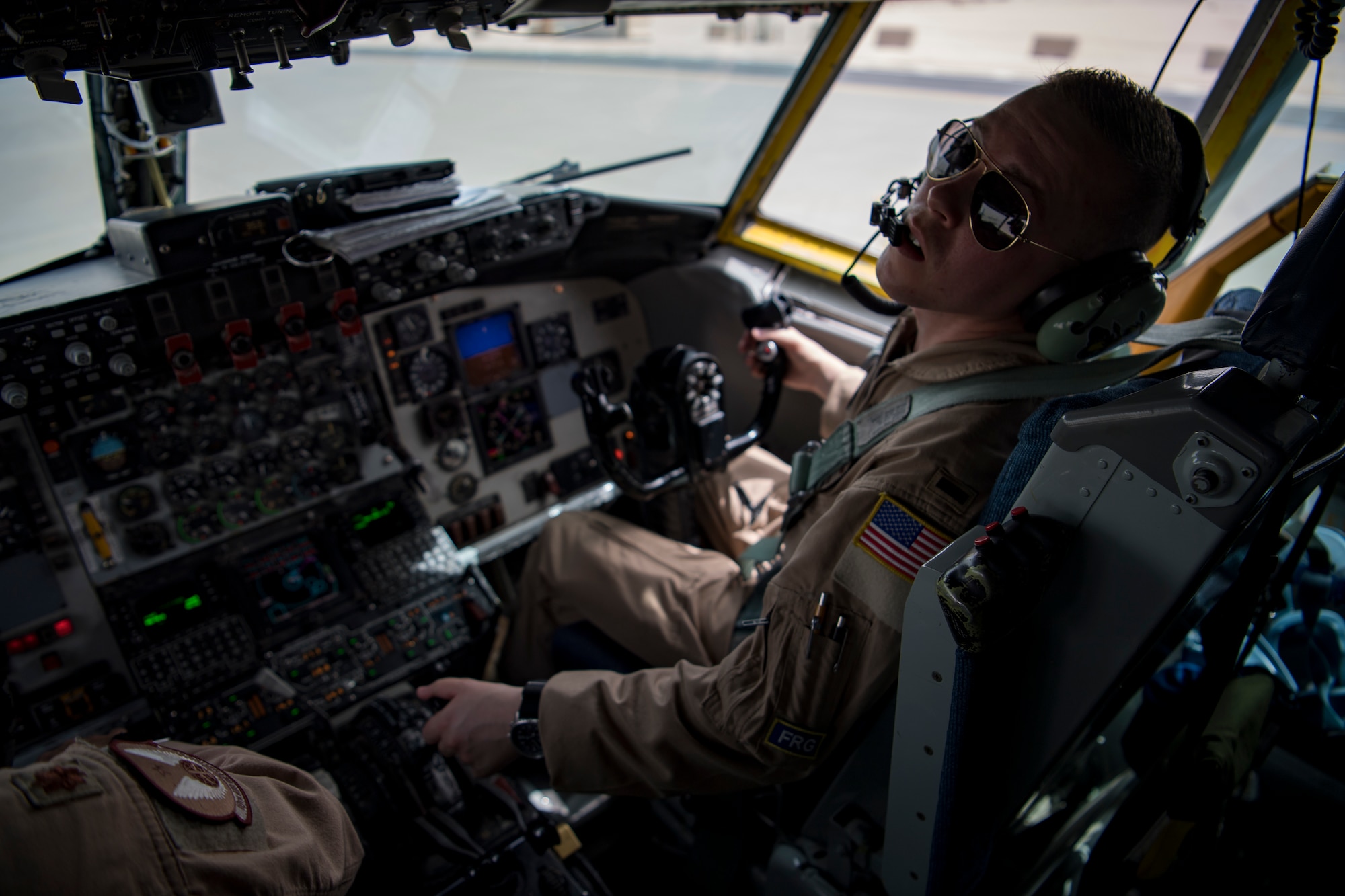 A U.S. Air Force KC-135 Stratotanker pilot assigned to the 28th Expeditionary Air Refueling Squadron conducts preflight checklists at Al Udeid Air Base, Qatar, April 2, 2020.