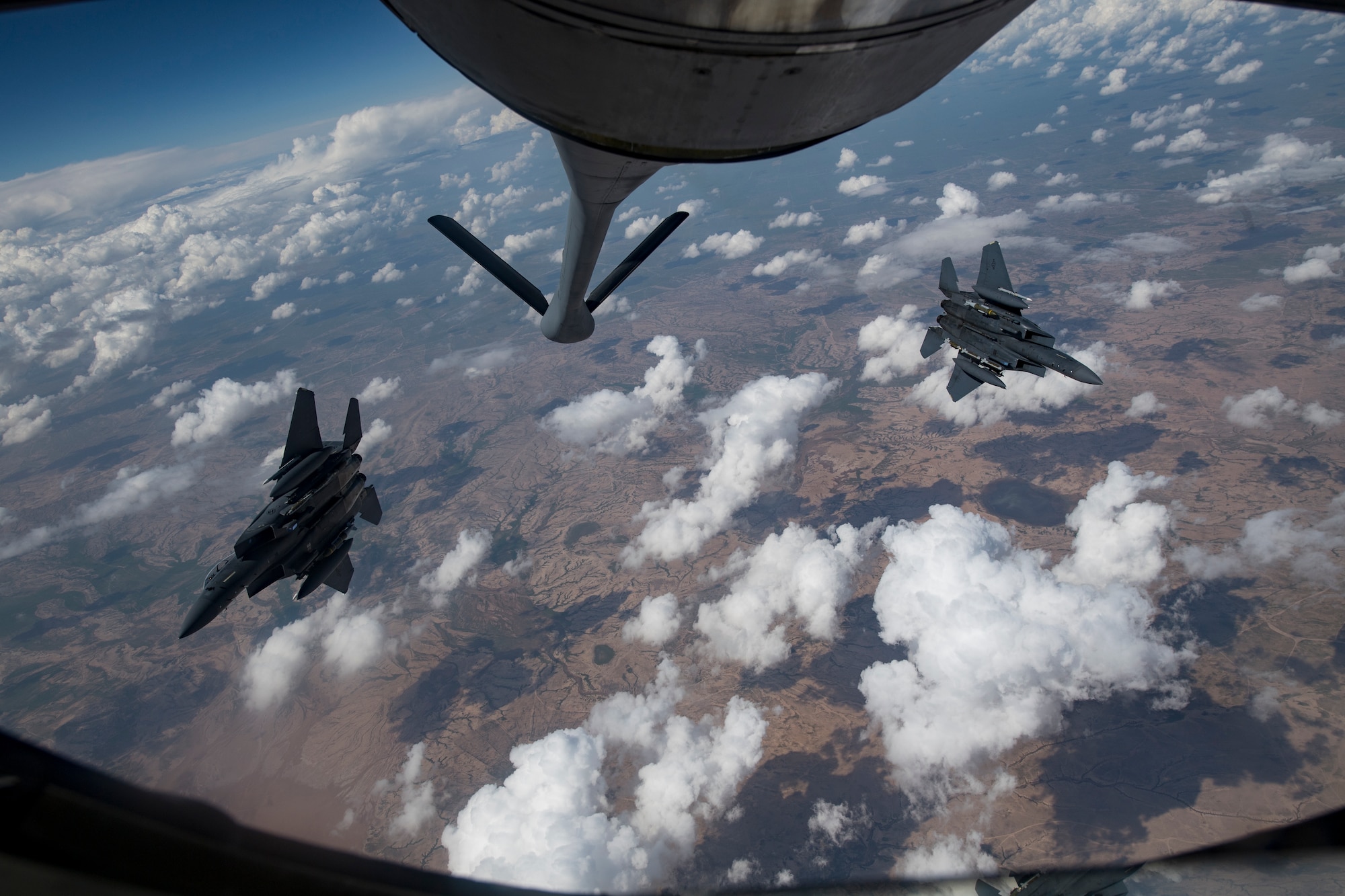 Two U.S. Air Force F-15E Strike Eagles fly over Iraq, April 2, 2020.