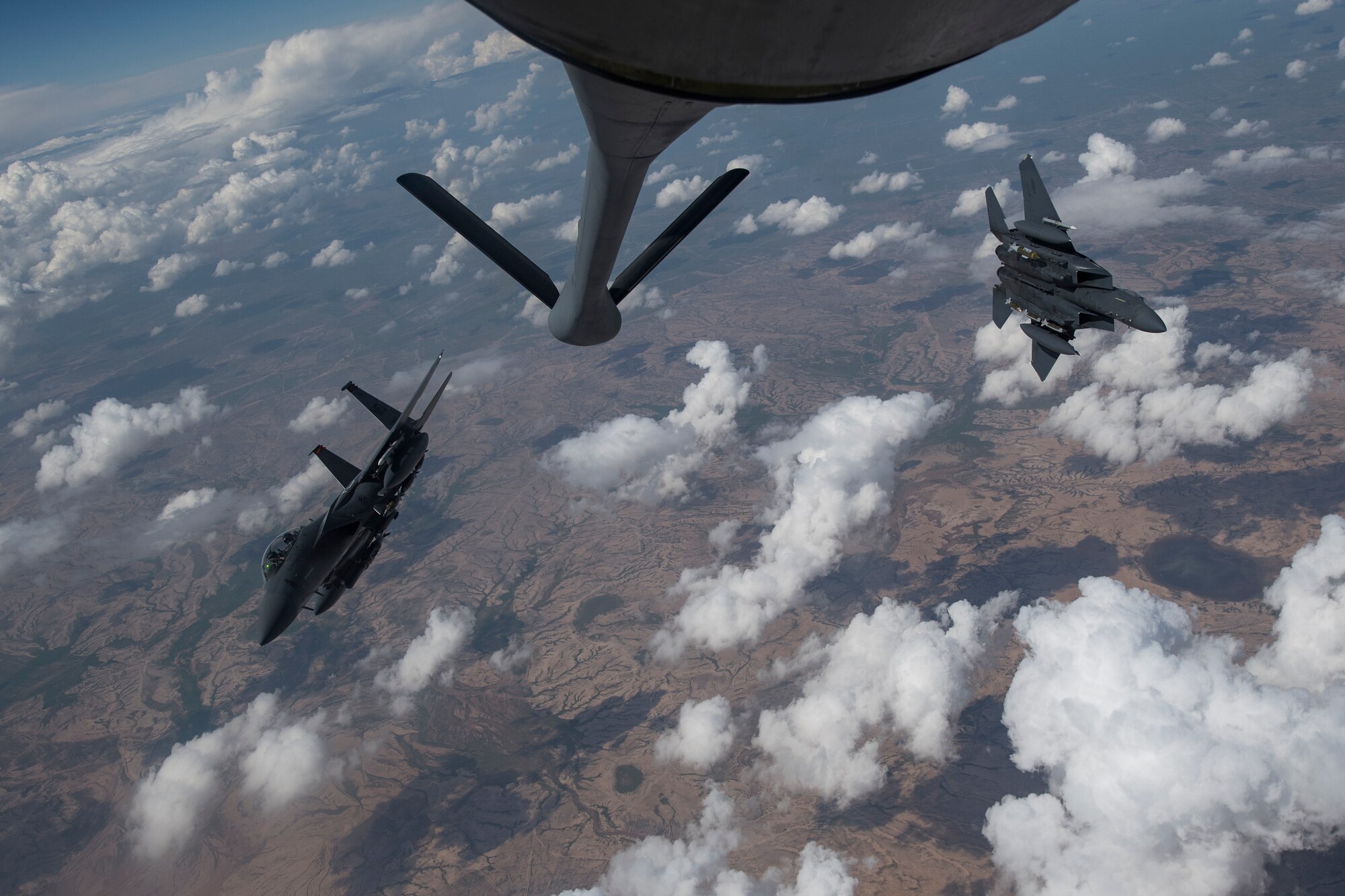 Two U.S. Air Force F-15E Strike Eagles fly over Iraq, April 2, 2020.
