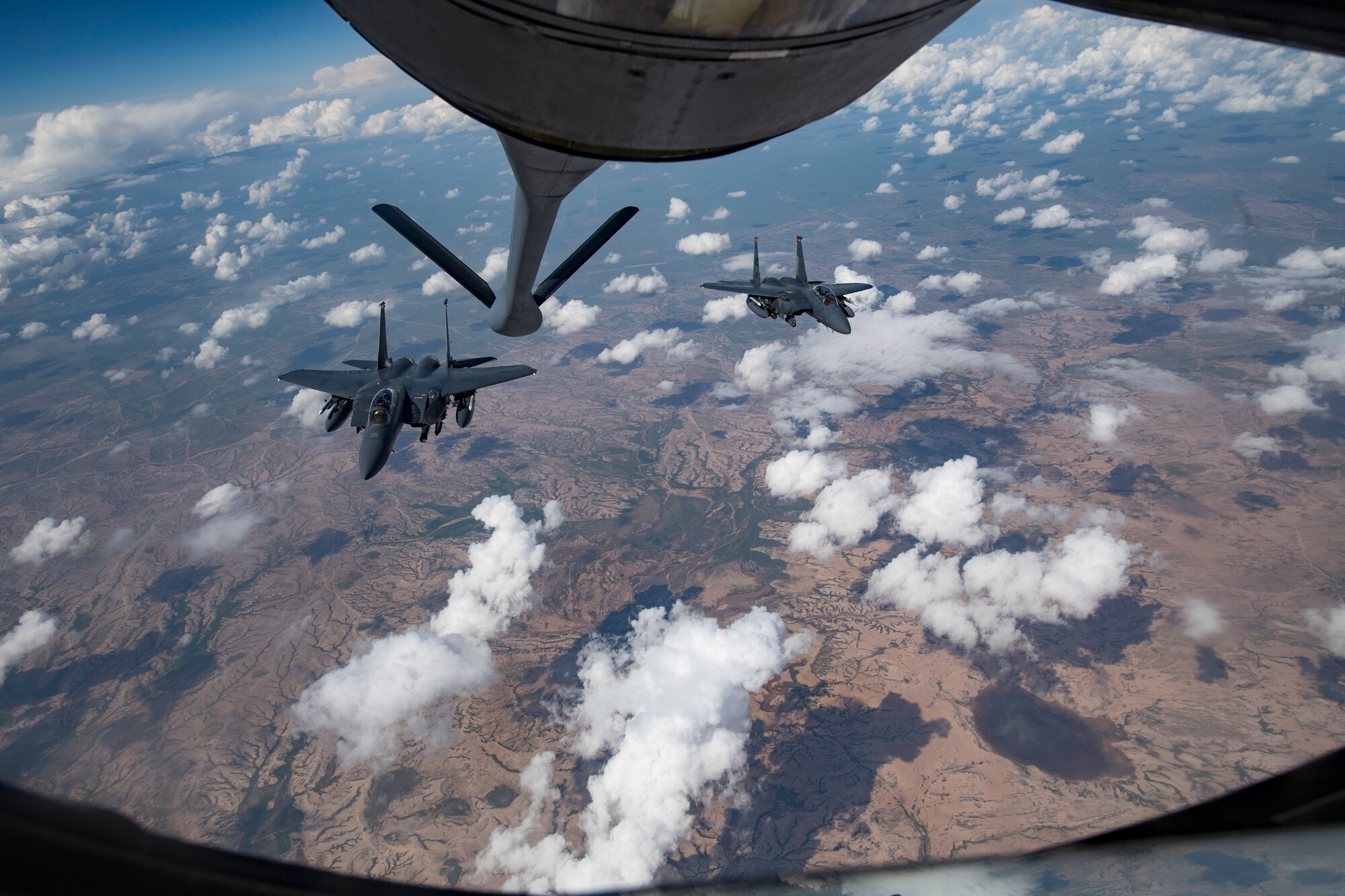Two U.S. Air Force F-15E Strike Eagles fly over Iraq, April 2, 2020.