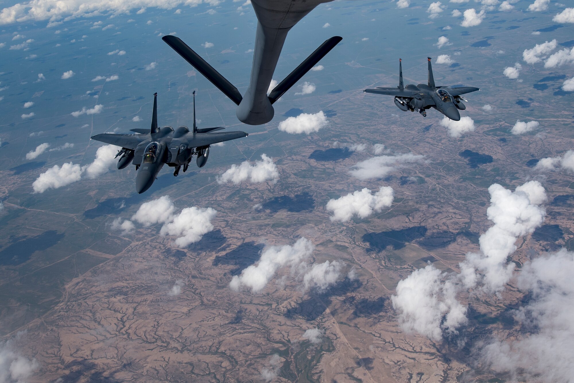 Two U.S. Air Force F-15E Strike Eagles fly over Iraq, April 2, 2020.